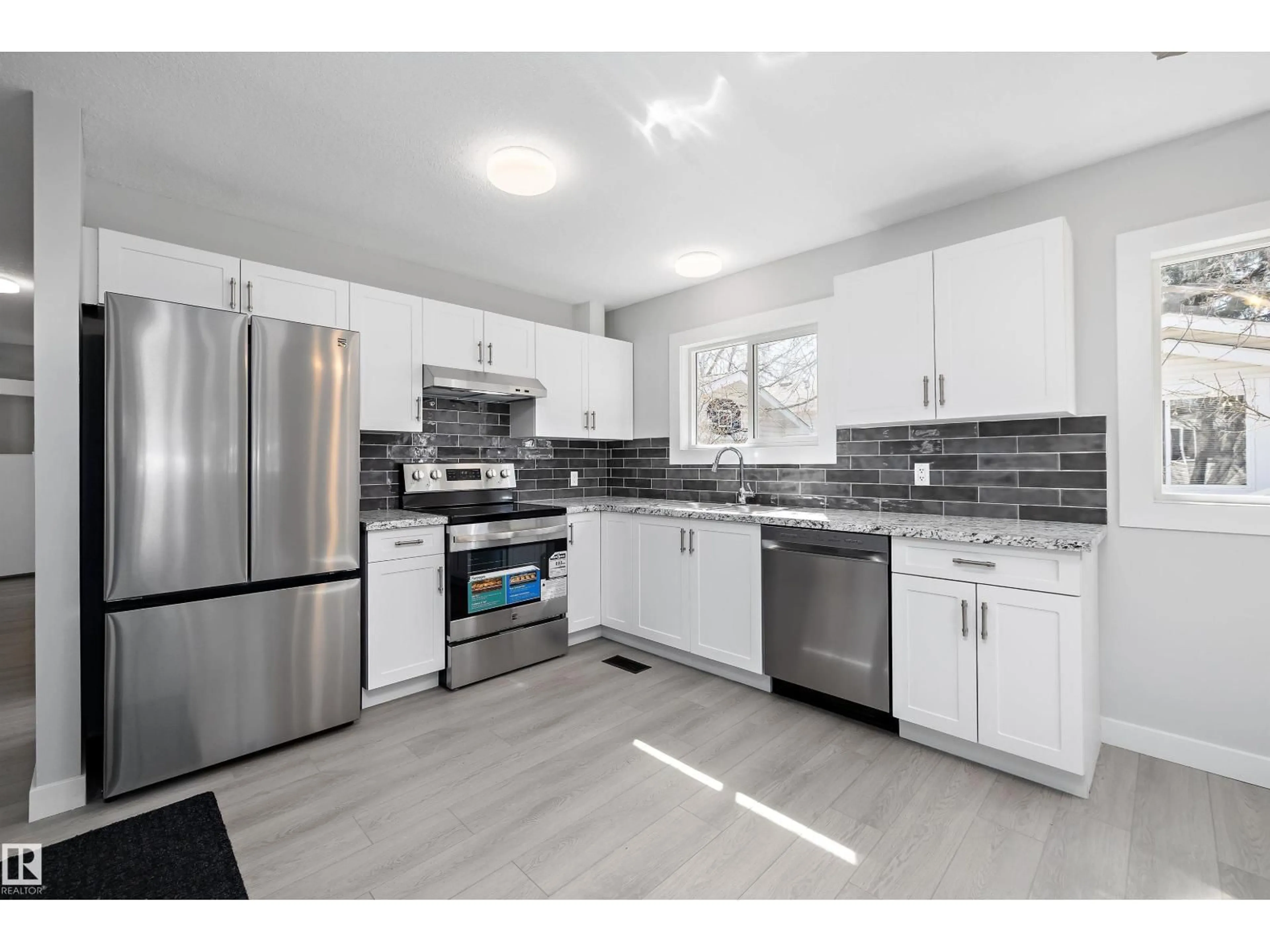 Open concept kitchen, unknown for 44 RIM RD, Edmonton Alberta T6P1G7