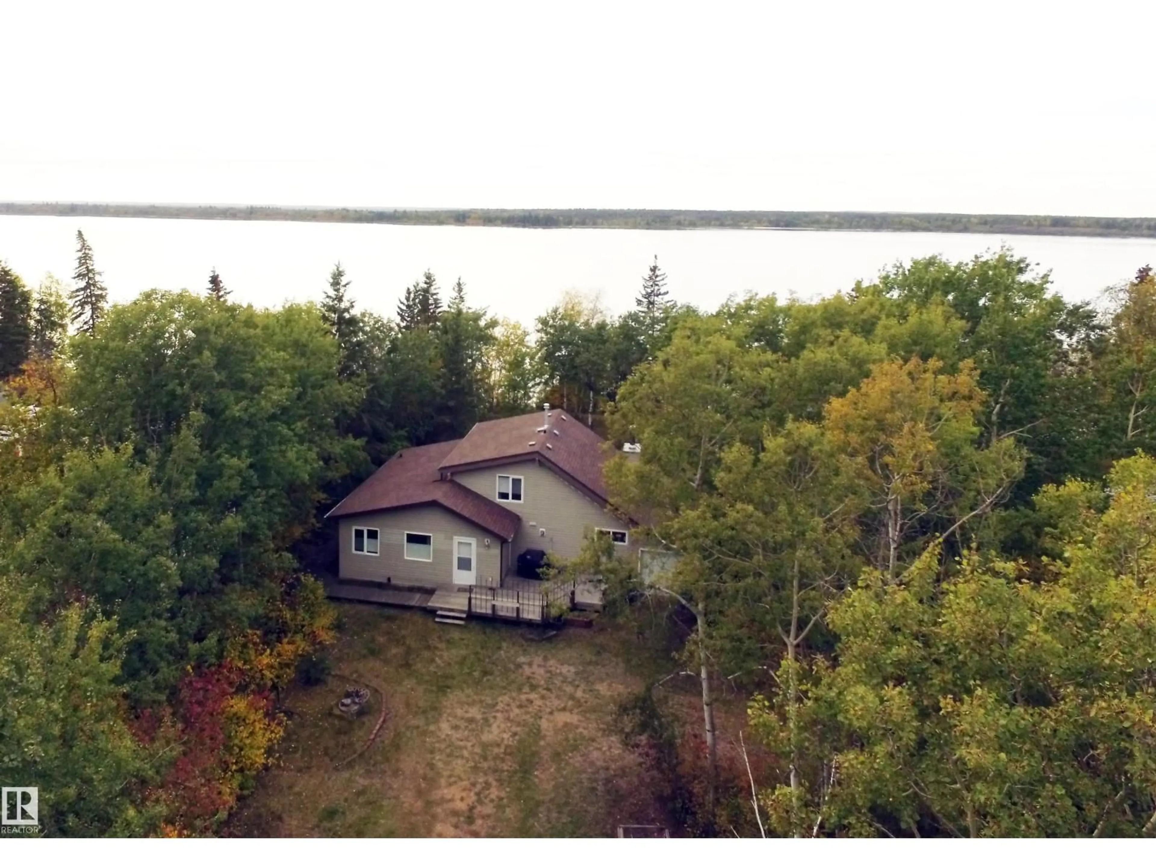 A pic from outside/outdoor area/front of a property/back of a property/a pic from drone, water/lake/river/ocean view for 4 KINGBIRD RD, Rural Bonnyville M.D. Alberta T9N2J6