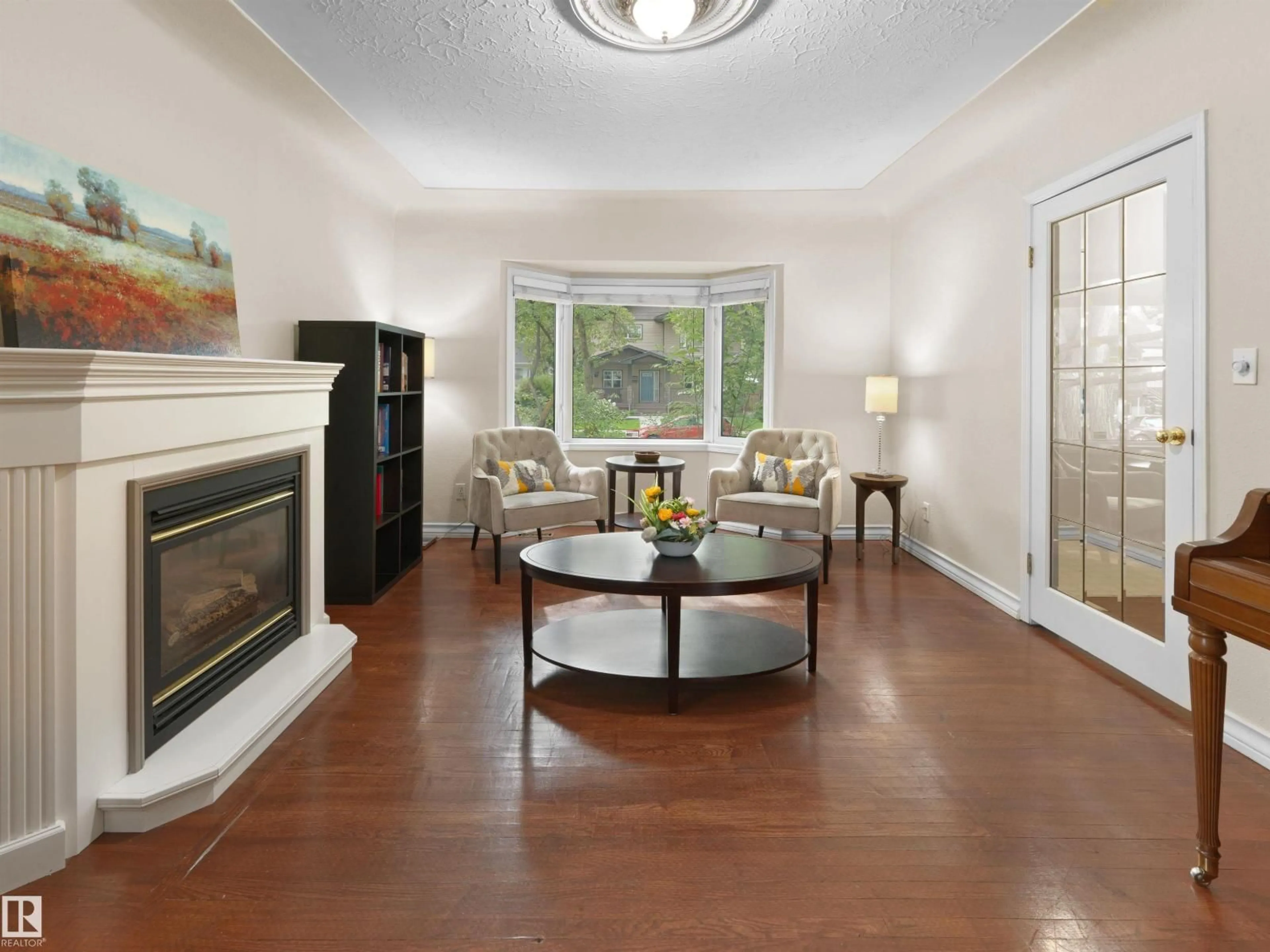 Living room with furniture, unknown for 10968 75 AV, Edmonton Alberta T6G0G9