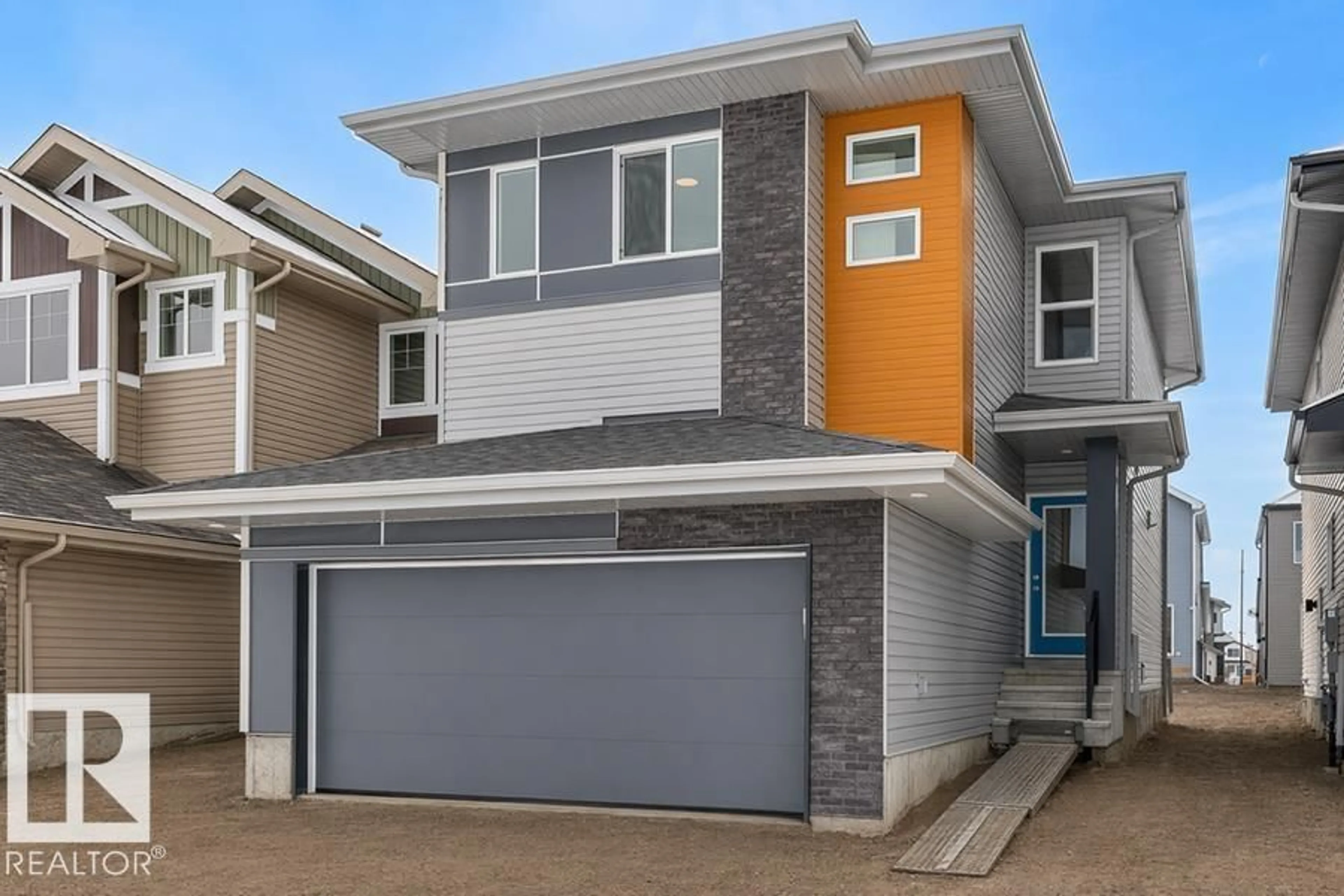 Home with vinyl exterior material, street for NW - 2816 190 ST, Edmonton Alberta T6M3H8