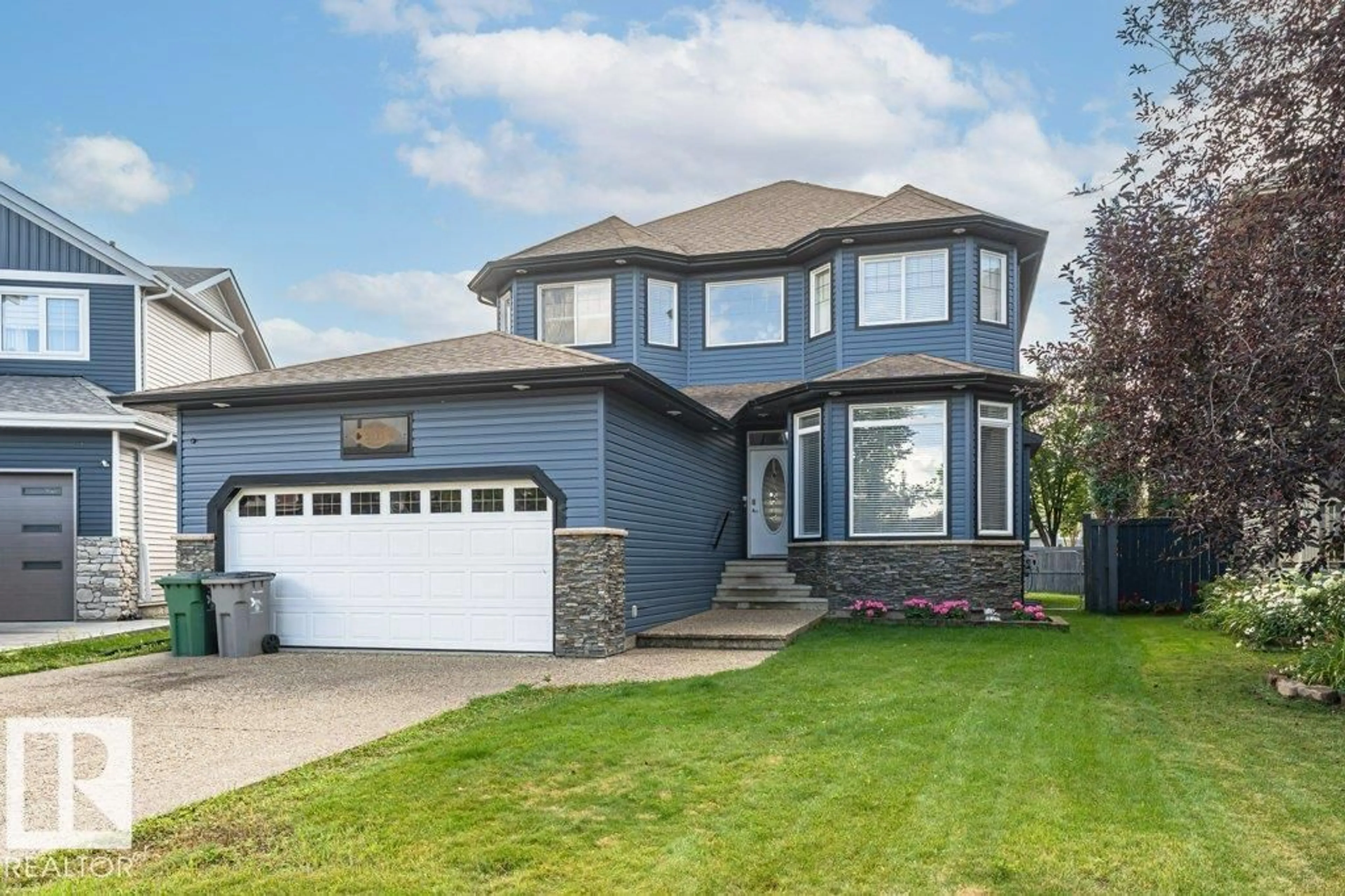 Home with vinyl exterior material, street for 5111 CHATEAU CO, Beaumont Alberta T4X1W5