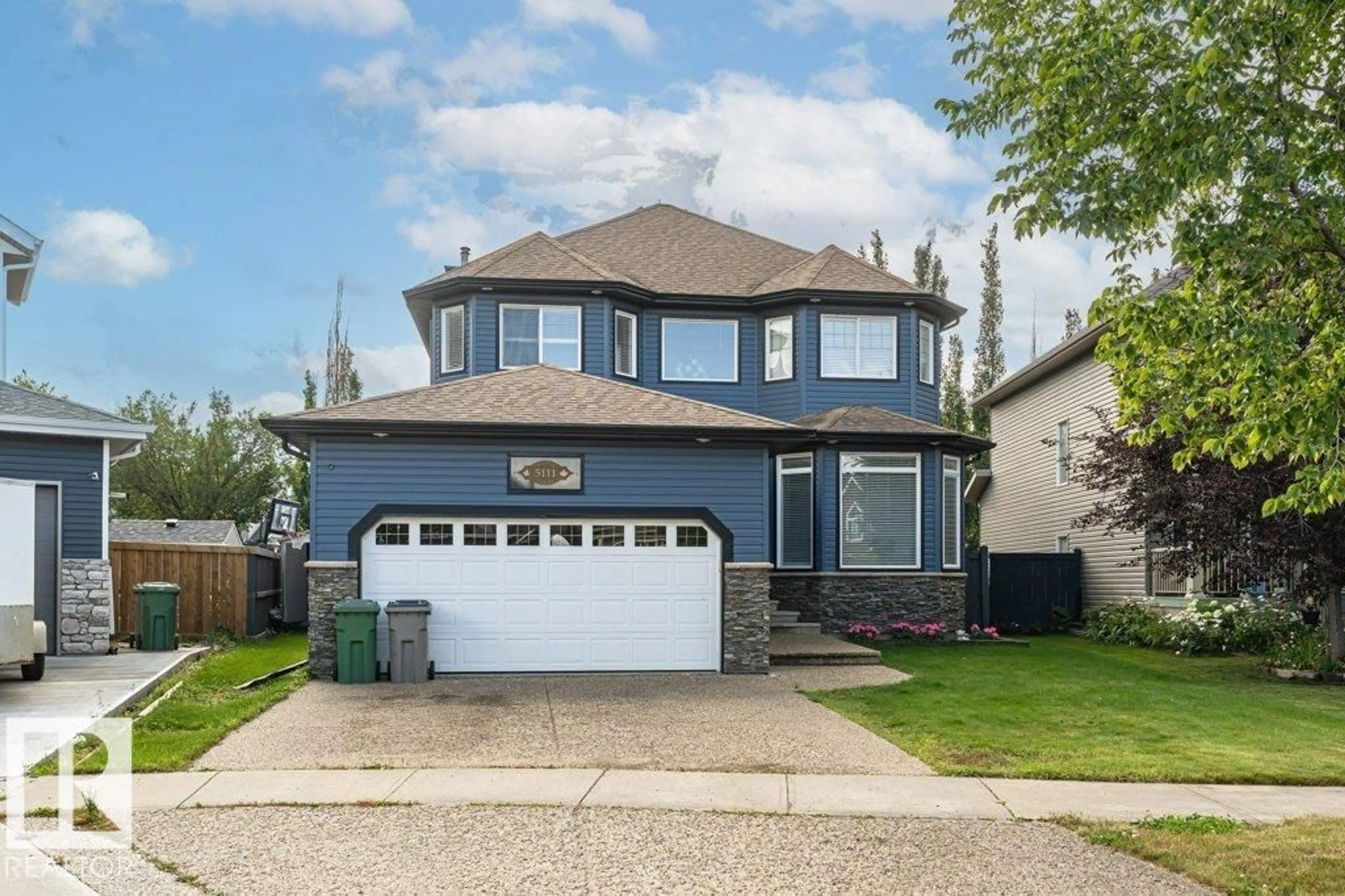 Home with vinyl exterior material, street for 5111 CHATEAU CO, Beaumont Alberta T4X1W5