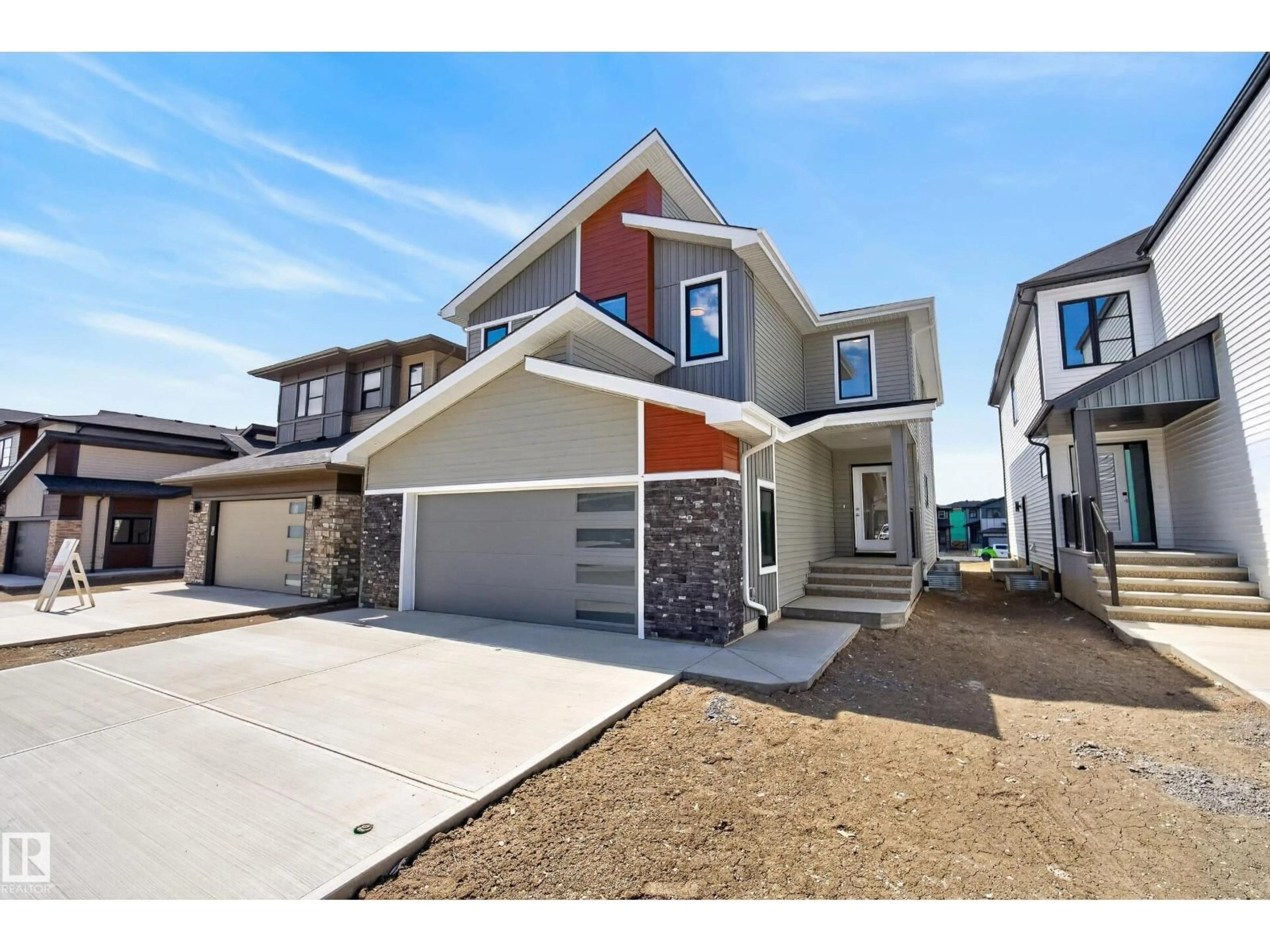Home with vinyl exterior material, street for 7089 KIVIAQ CR, Edmonton Alberta T6W5N7
