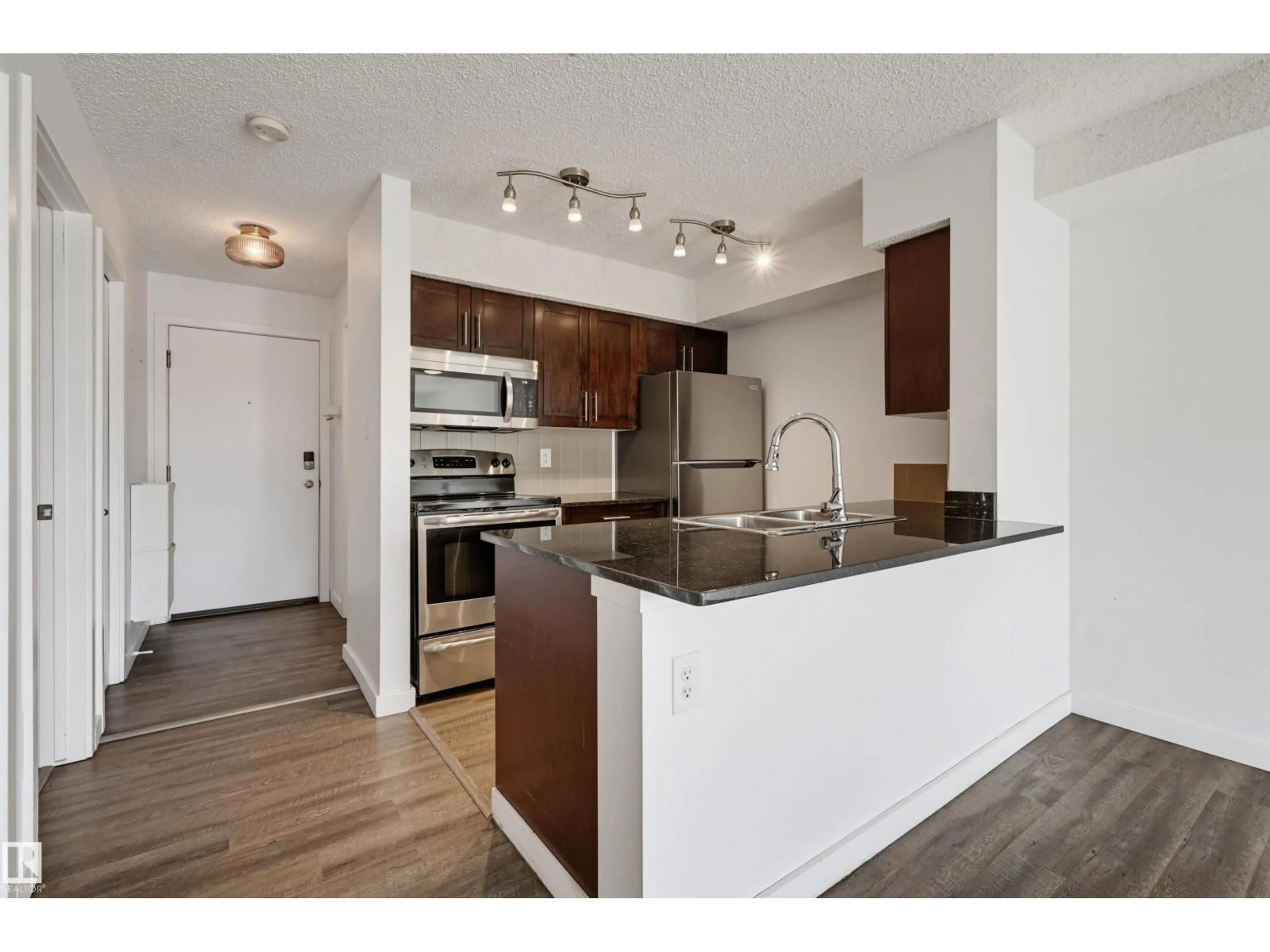 Standard kitchen, wood/laminate floor for #309 - 1060 MCCONACHIE BV, Edmonton Alberta T5Y0W9