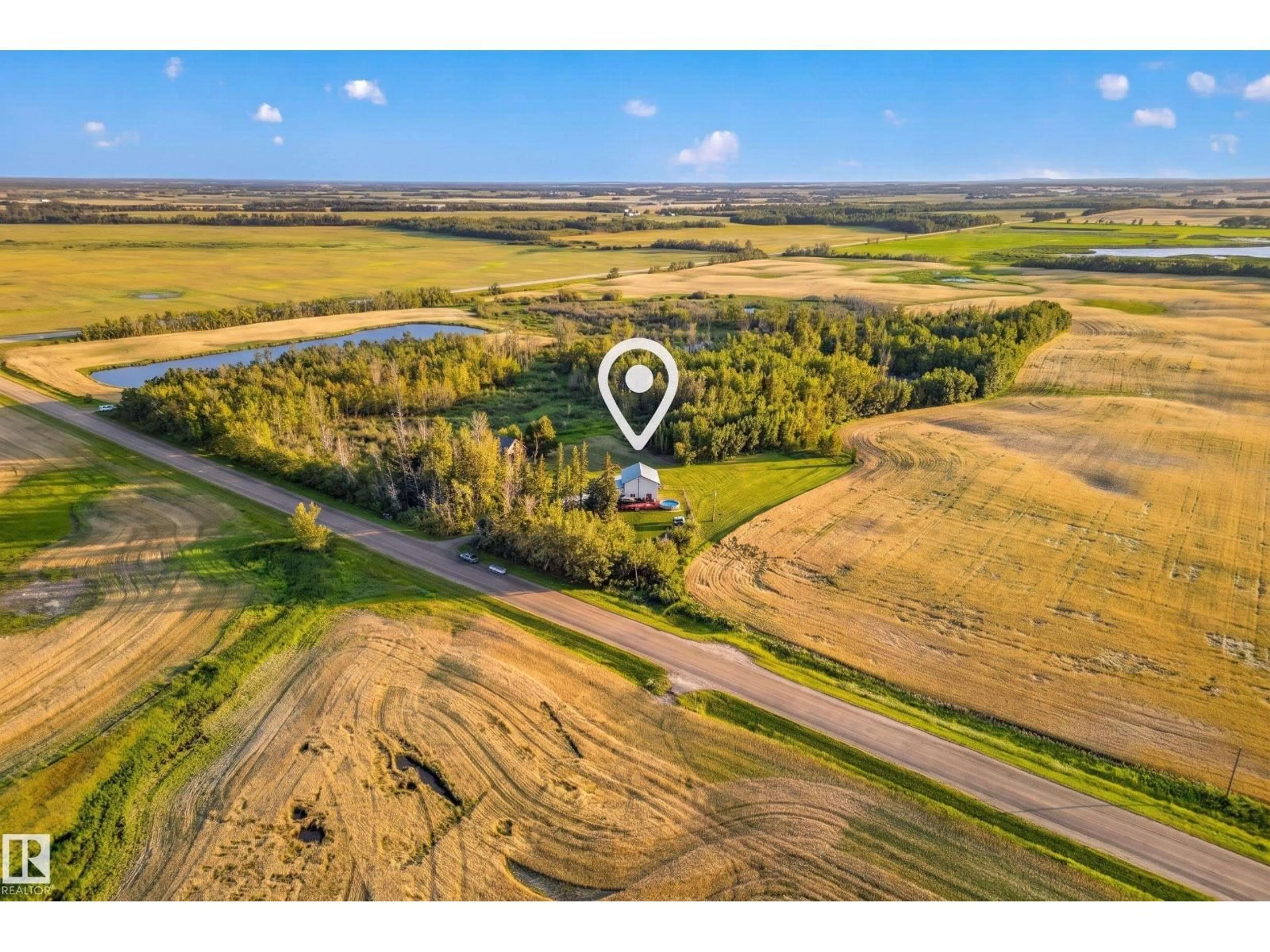 A pic from outside/outdoor area/front of a property/back of a property/a pic from drone, water/lake/river/ocean view for 553061 RANGE ROAD 184, Rural Lamont County Alberta T0B2R0