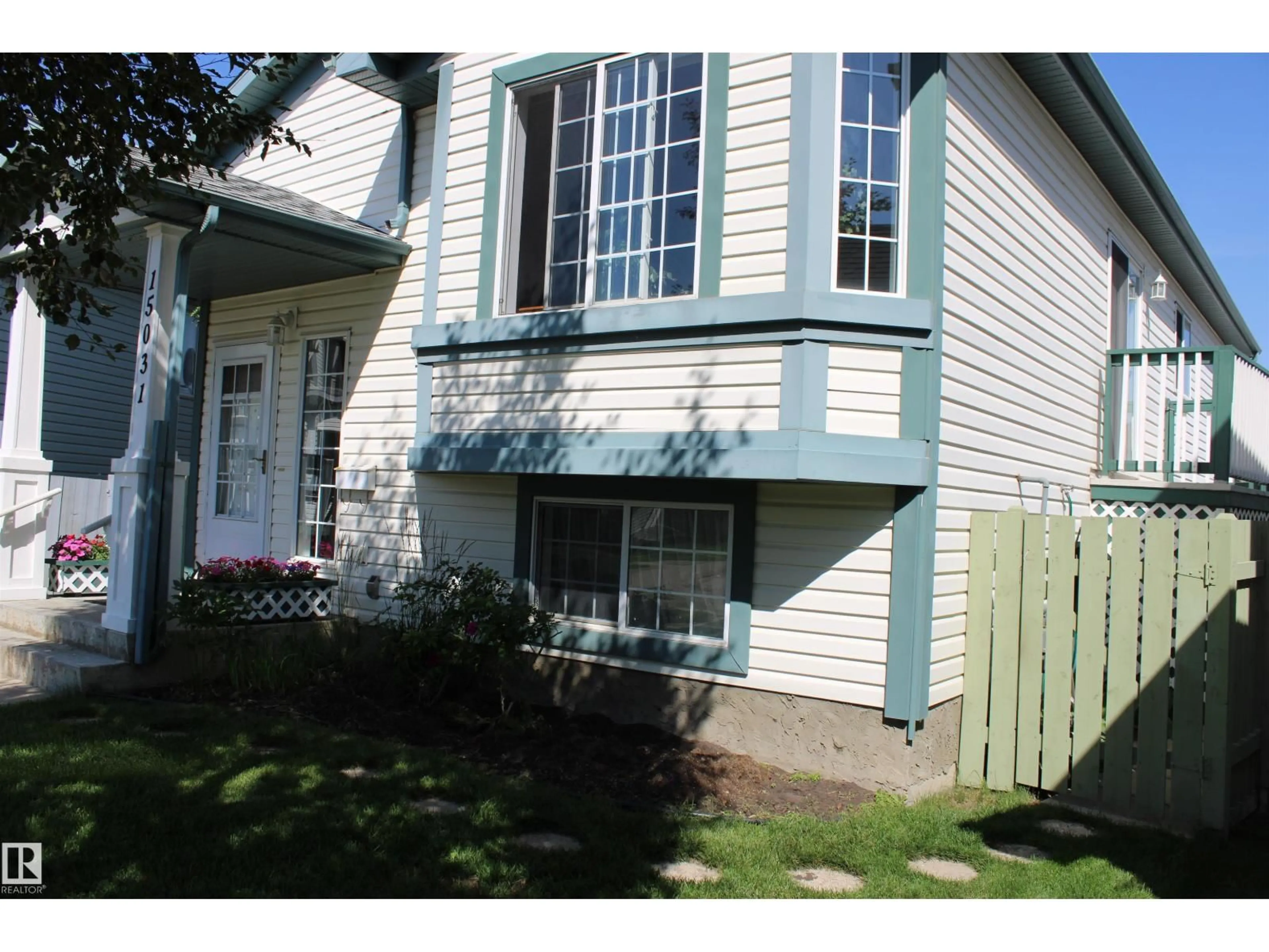 Home with vinyl exterior material, street for NW - 15031 135 ST, Edmonton Alberta T6V1M9