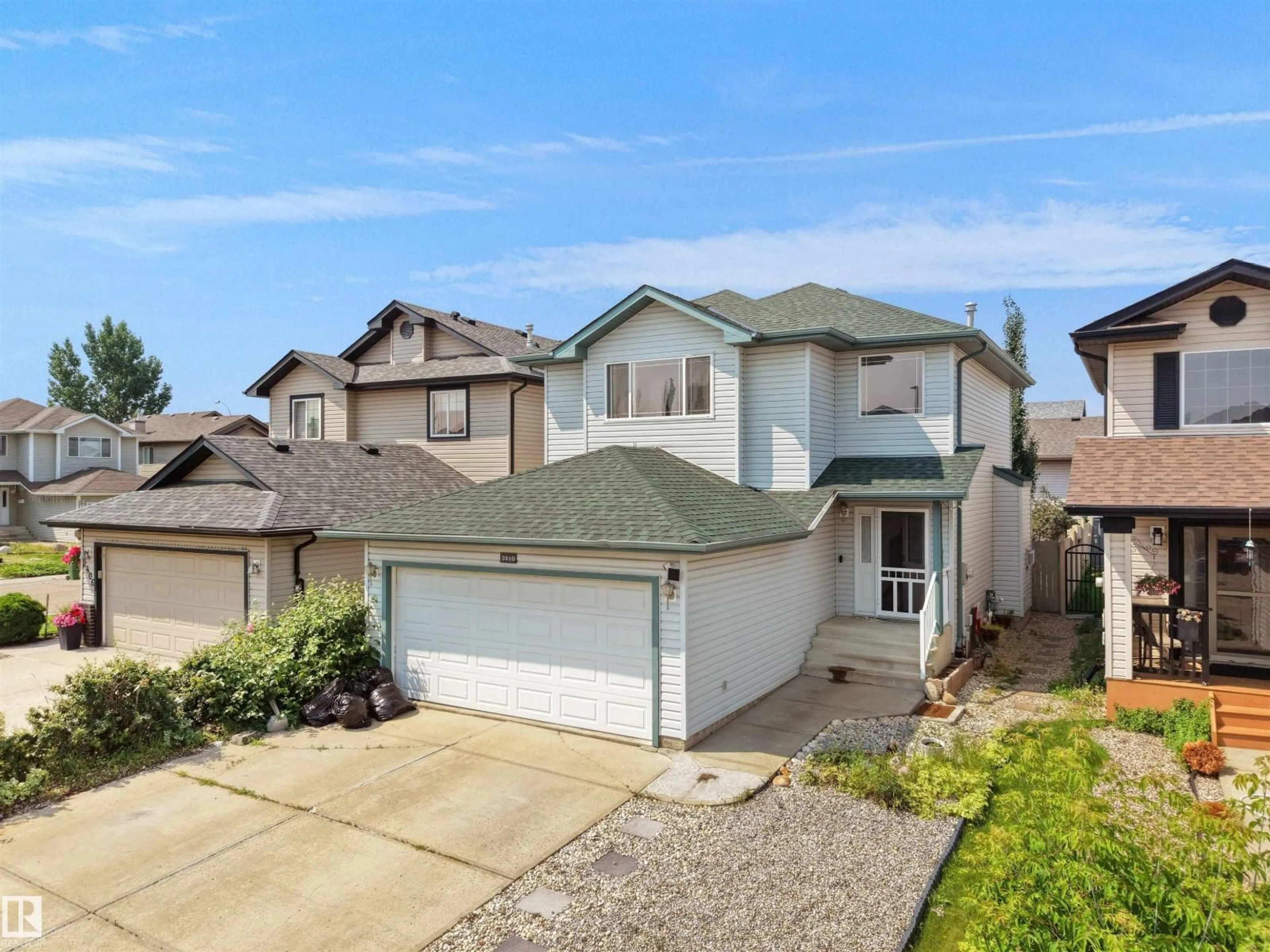 A pic from outside/outdoor area/front of a property/back of a property/a pic from drone, street for NW - 2410 32B ST, Edmonton Alberta T6T1Y6