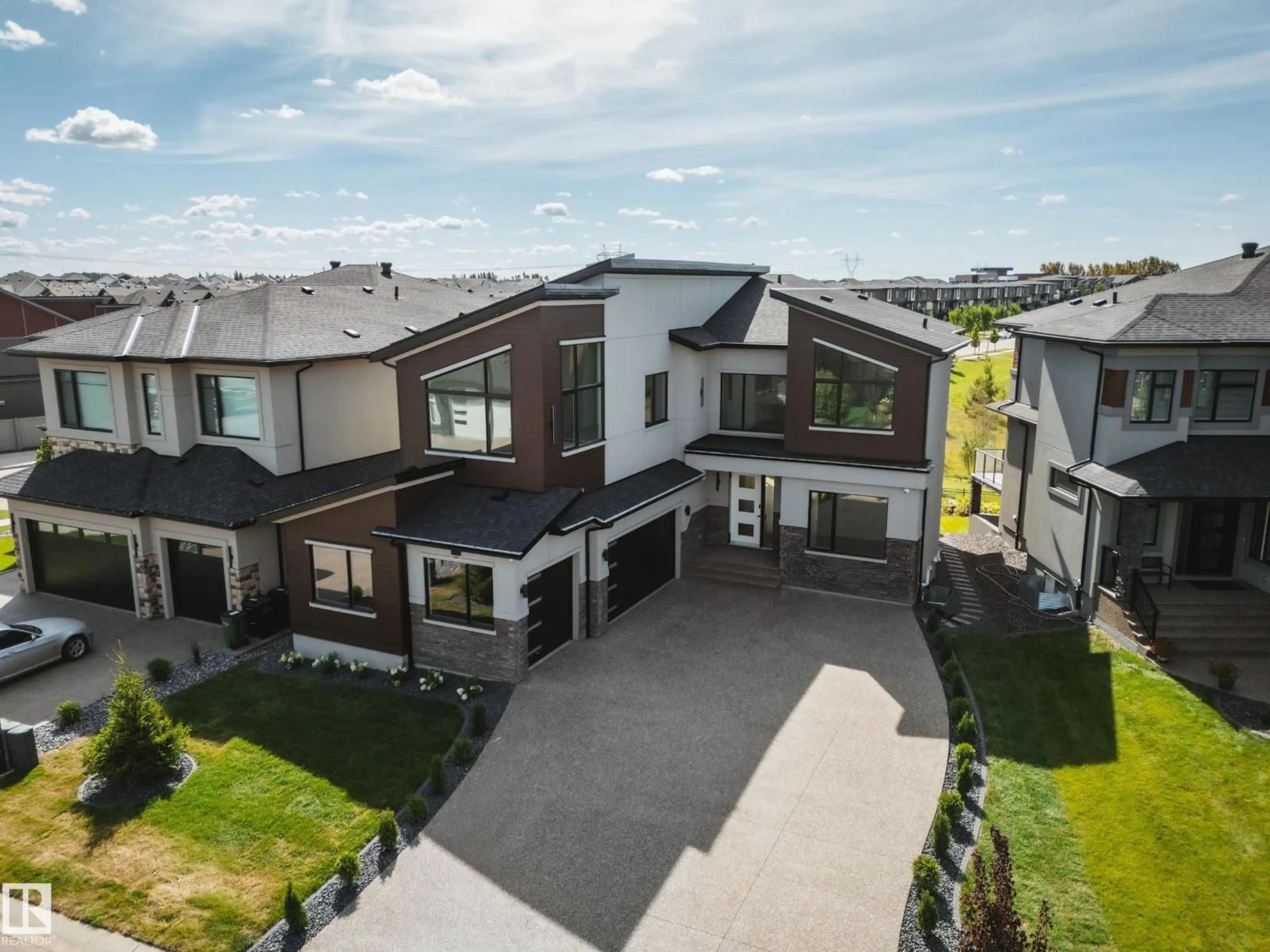 A pic from outside/outdoor area/front of a property/back of a property/a pic from drone, street for 5605 CAUTLEY CV, Edmonton Alberta T6W4P7