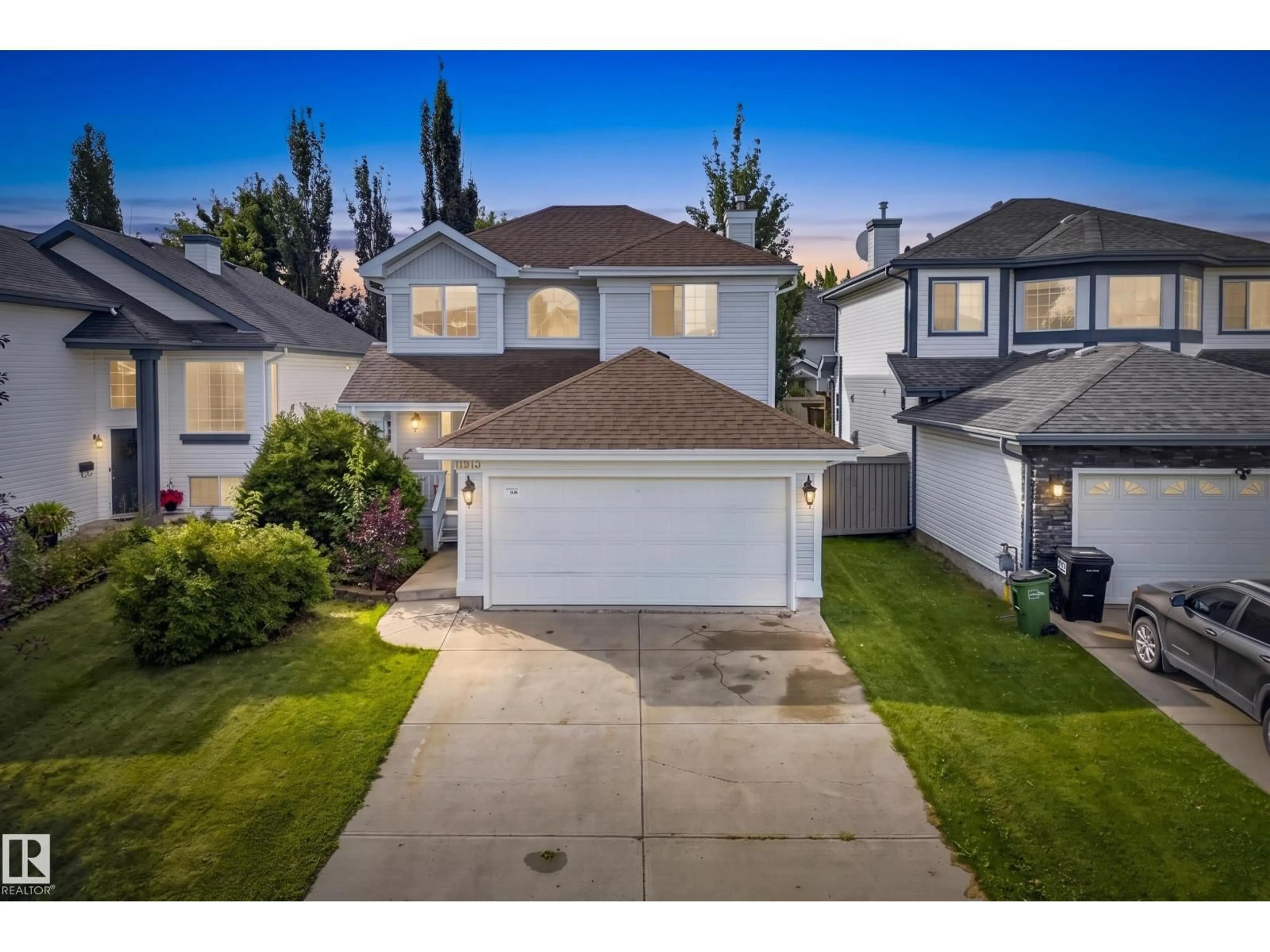 A pic from outside/outdoor area/front of a property/back of a property/a pic from drone, street for 11813 11B AV NW, Edmonton Alberta T6J7E3
