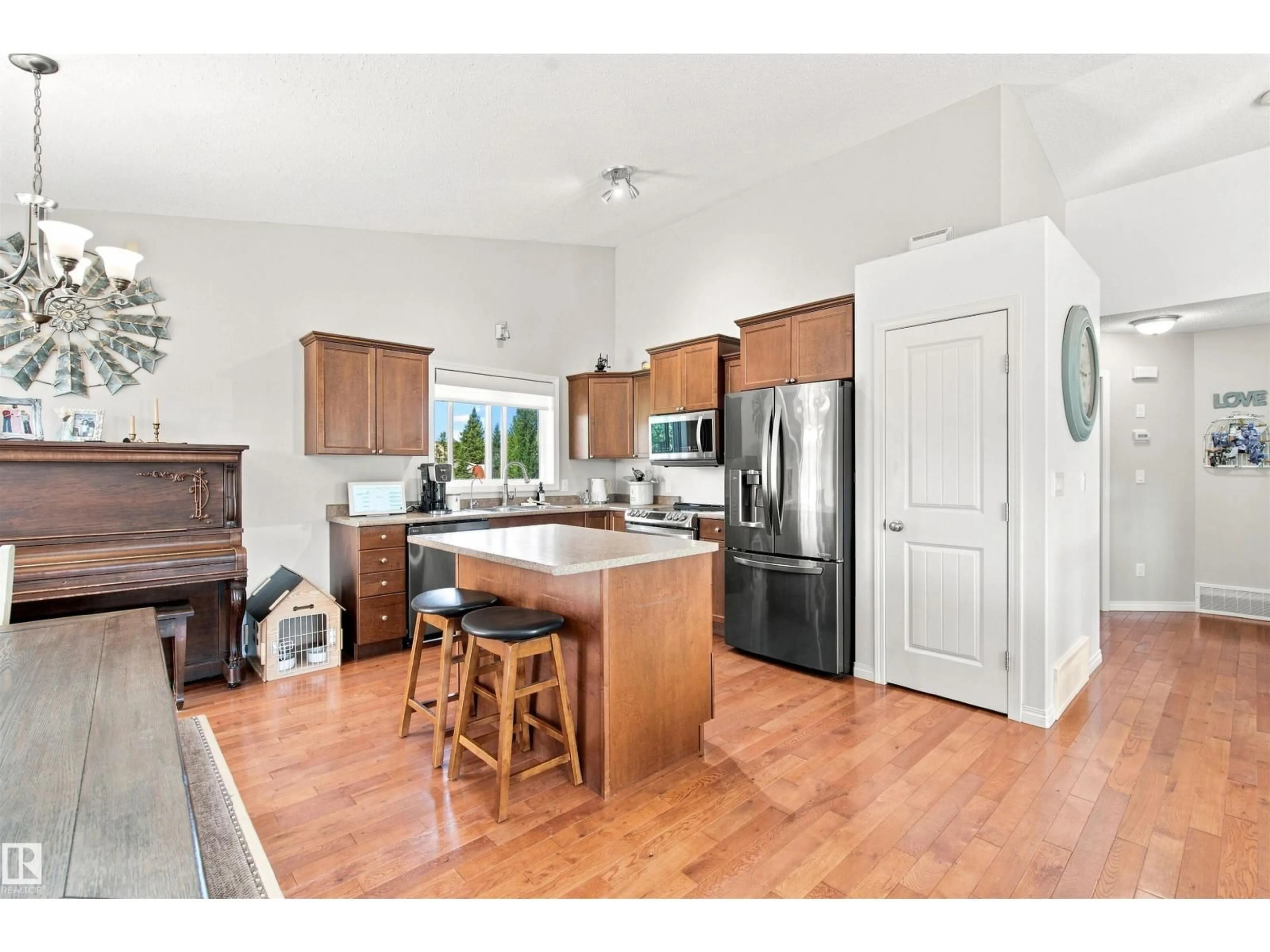 Open concept kitchen, wood/laminate floor for 4906 PARK CR, Cherry Grove Alberta T0A0T0