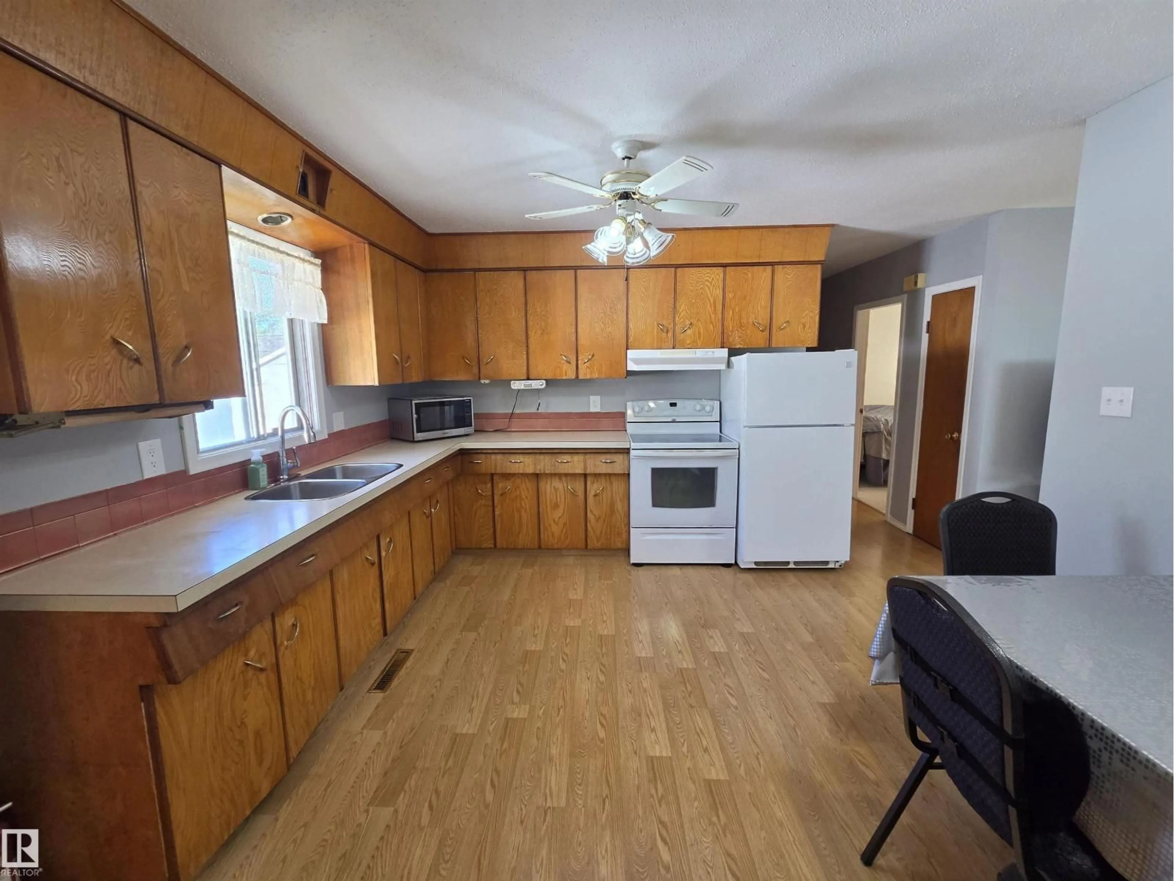 Standard kitchen, wood/laminate floor for 4721 44 AVE, Bonnyville Town Alberta T9N1N8