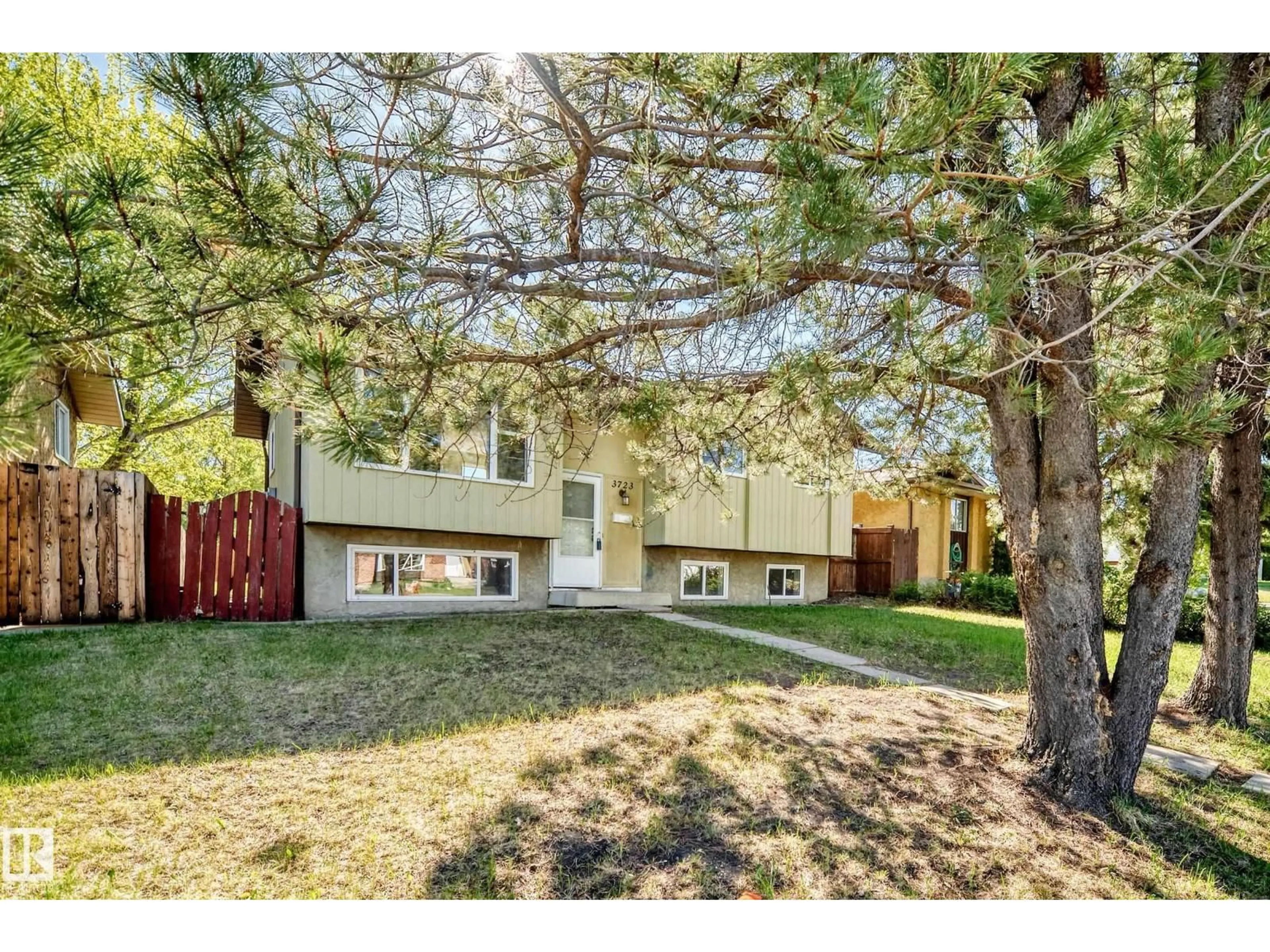 Home with vinyl exterior material, street for 3723 63 ST, Edmonton Alberta T6L1R1