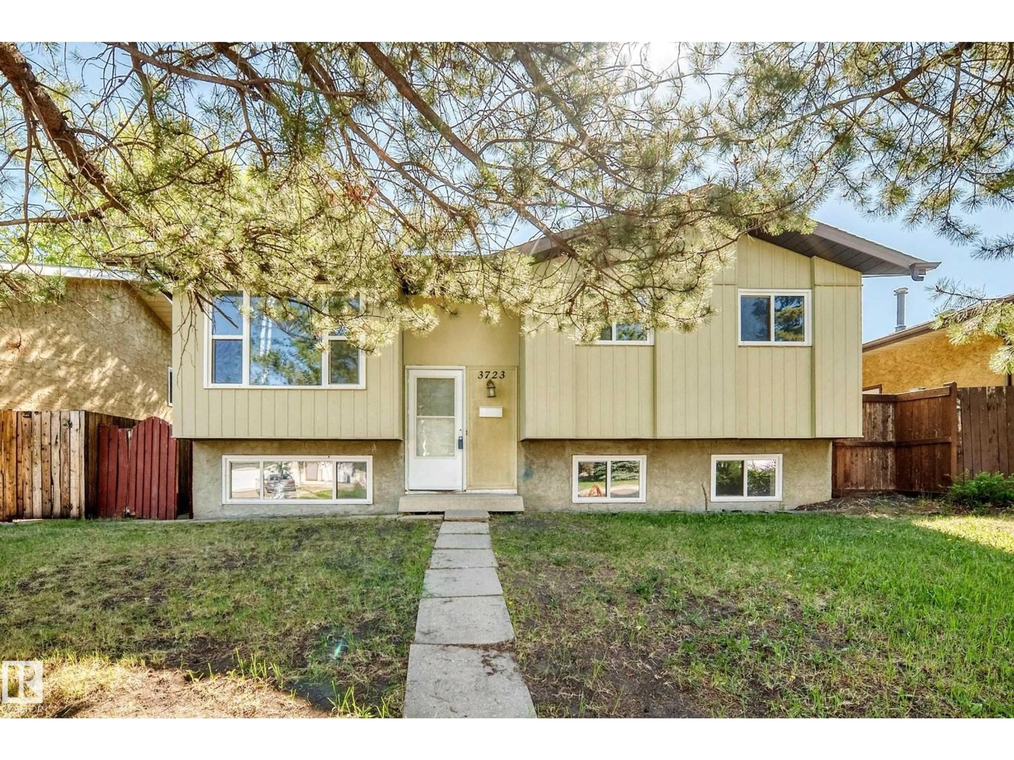Home with vinyl exterior material, street for 3723 63 ST, Edmonton Alberta T6L1R1
