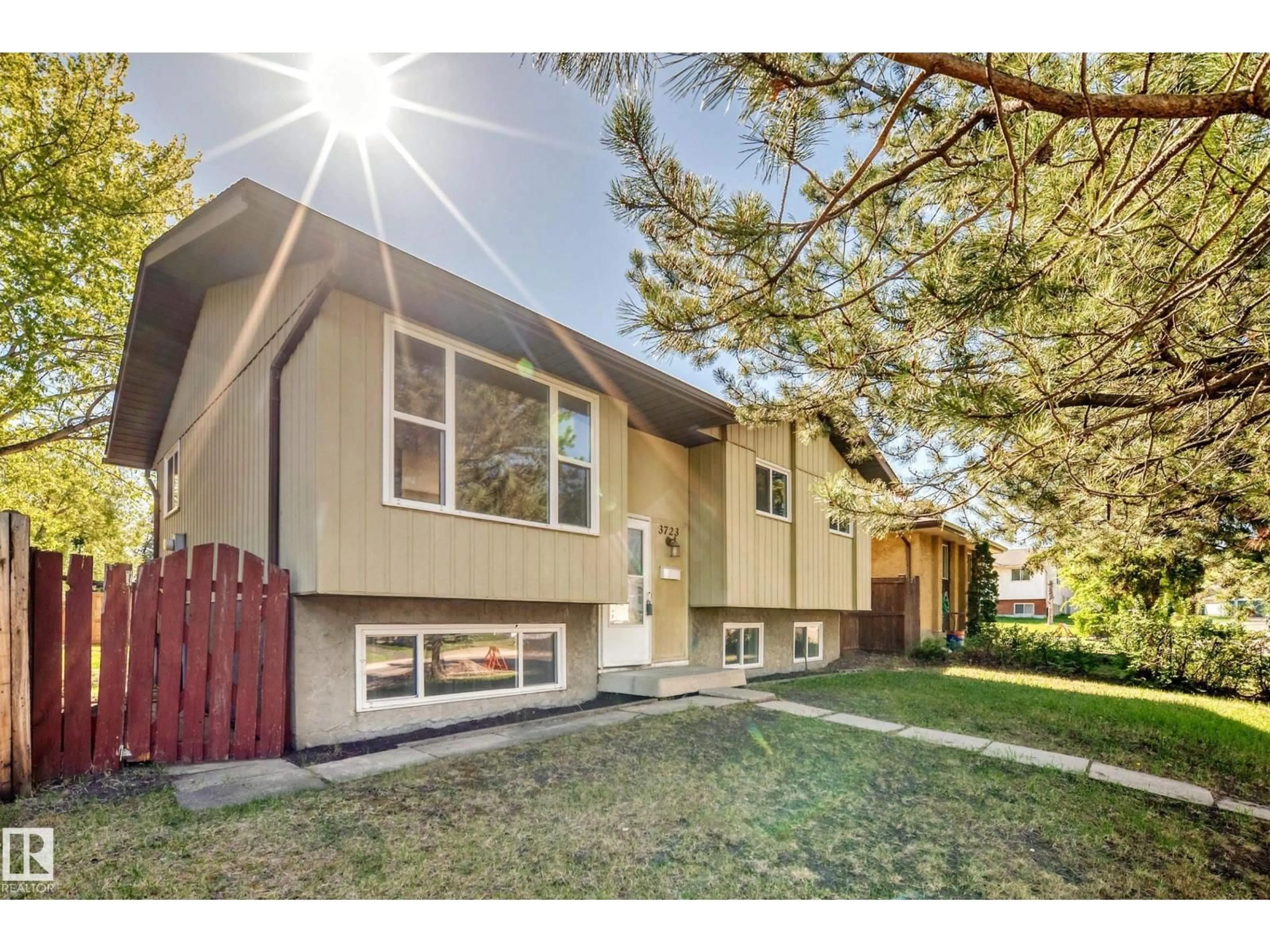 Home with vinyl exterior material, street for 3723 63 ST, Edmonton Alberta T6L1R1