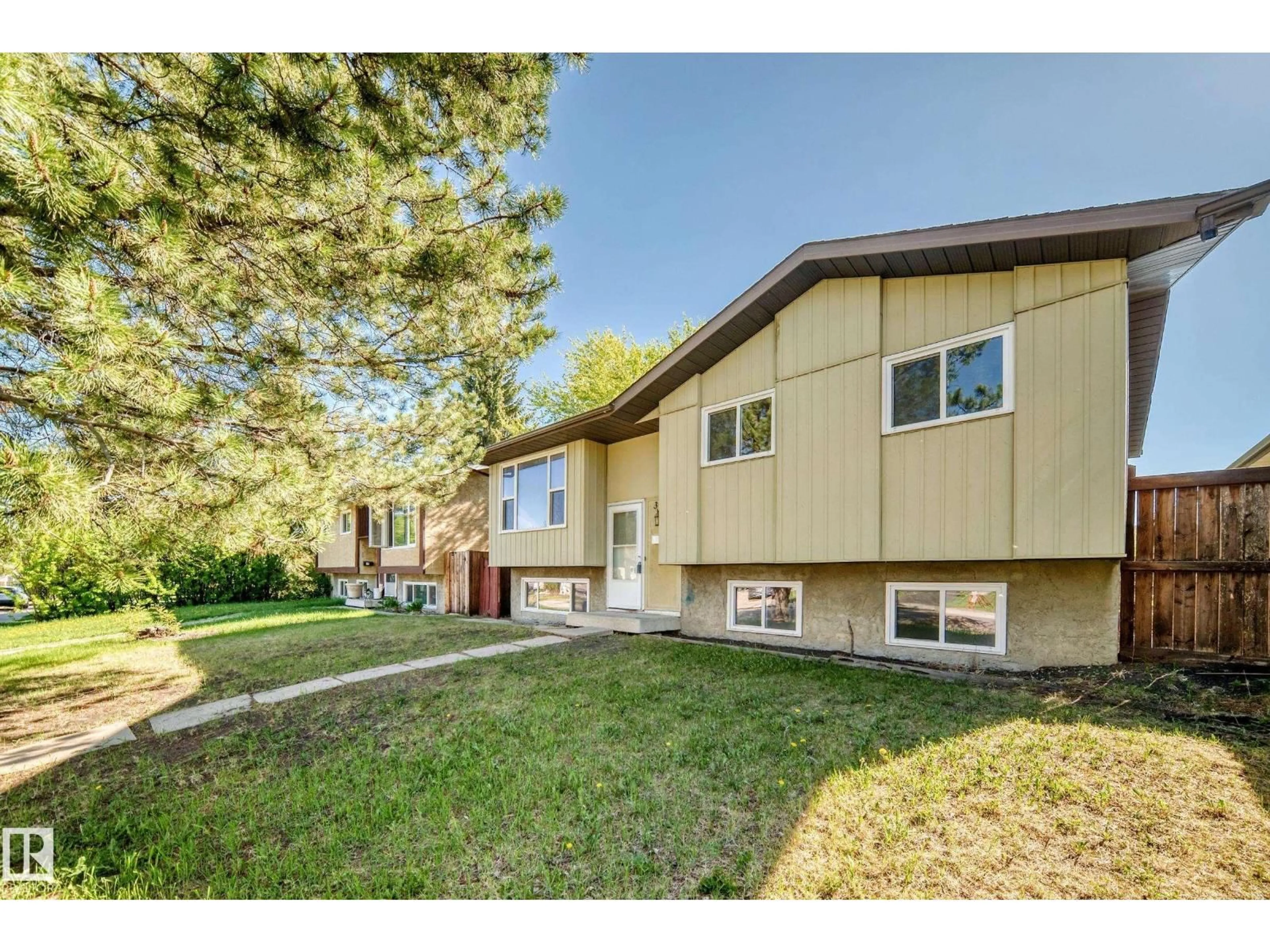 Home with vinyl exterior material, street for 3723 63 ST, Edmonton Alberta T6L1R1