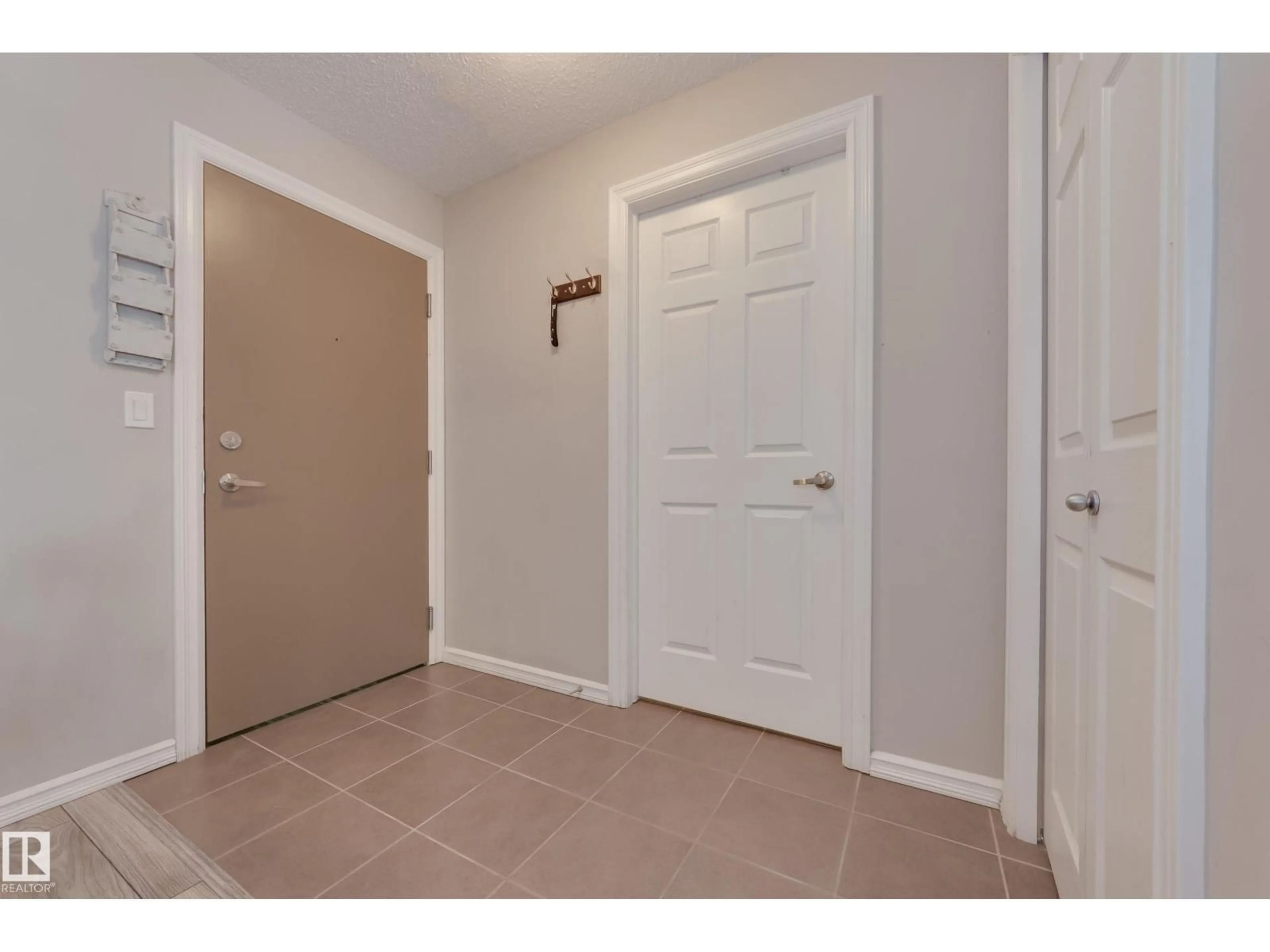 Indoor entryway for #213 - 4403 23 ST, Edmonton Alberta T6T0E4
