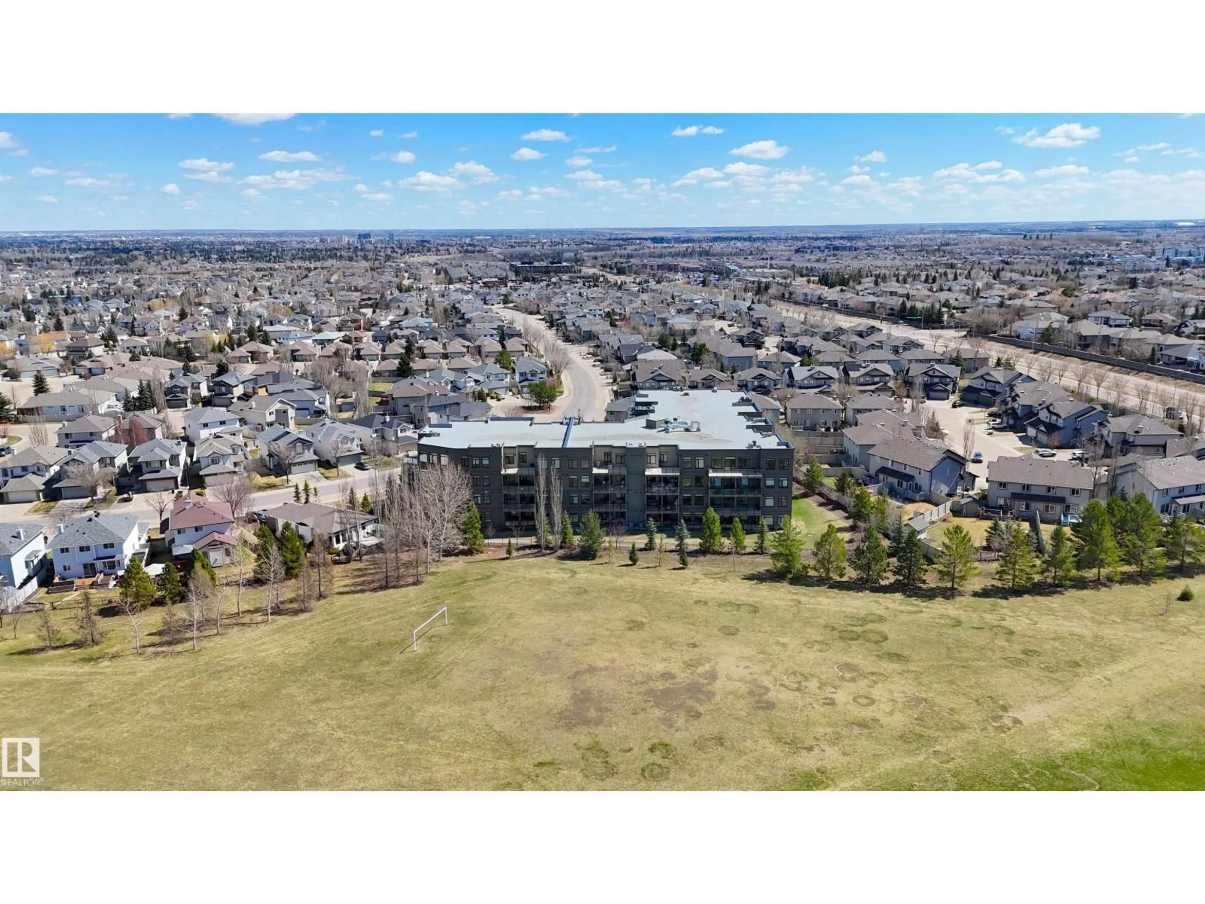 A pic from outside/outdoor area/front of a property/back of a property/a pic from drone, mountain view for #101 - 625 LEGER WY, Edmonton Alberta T6R2T1