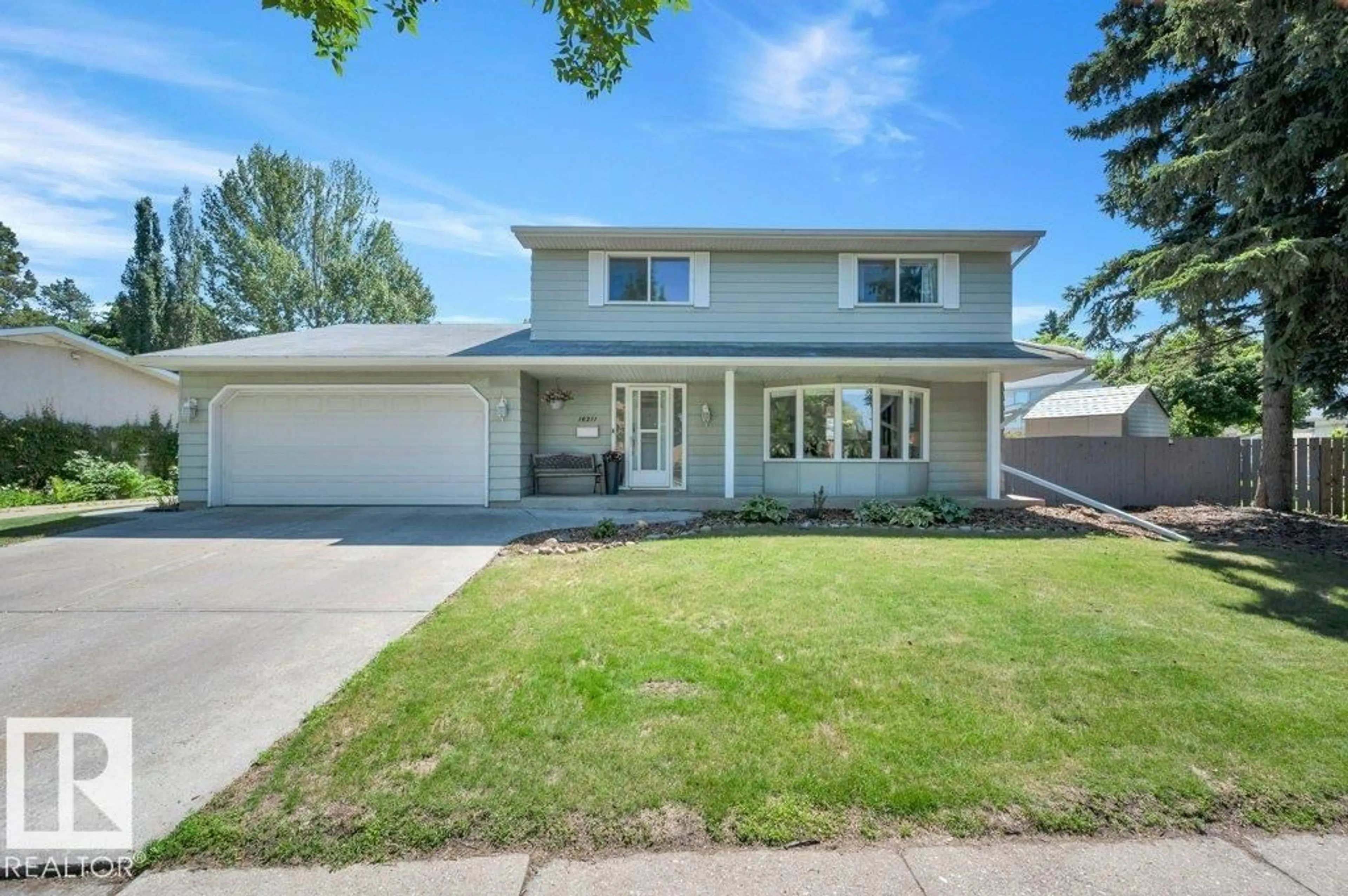 Home with vinyl exterior material, street for 16211 78 AV, Edmonton Alberta T5R3E5