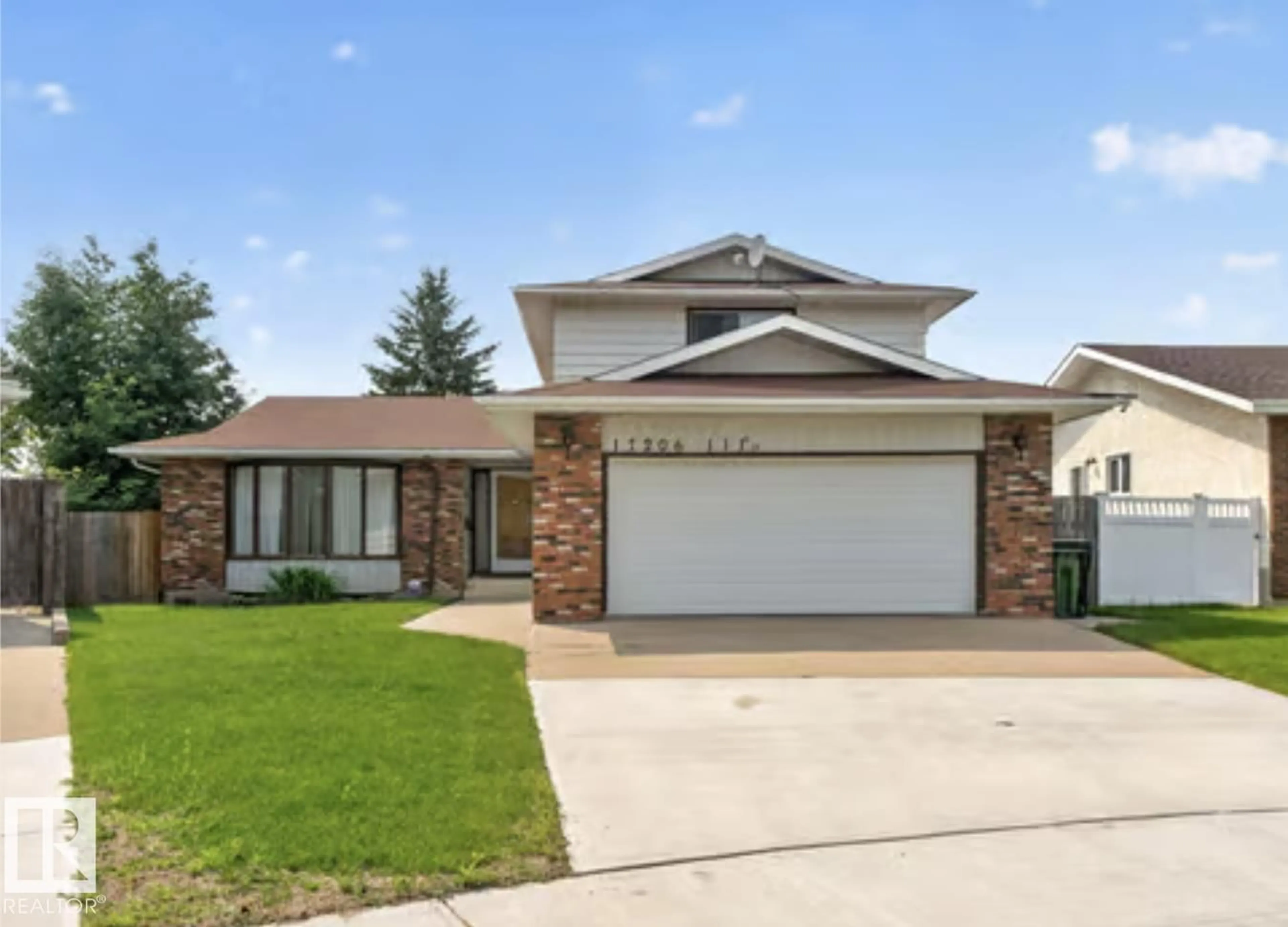 Home with brick exterior material, street for 17206 111A ST NW, Edmonton Alberta T5X3K2
