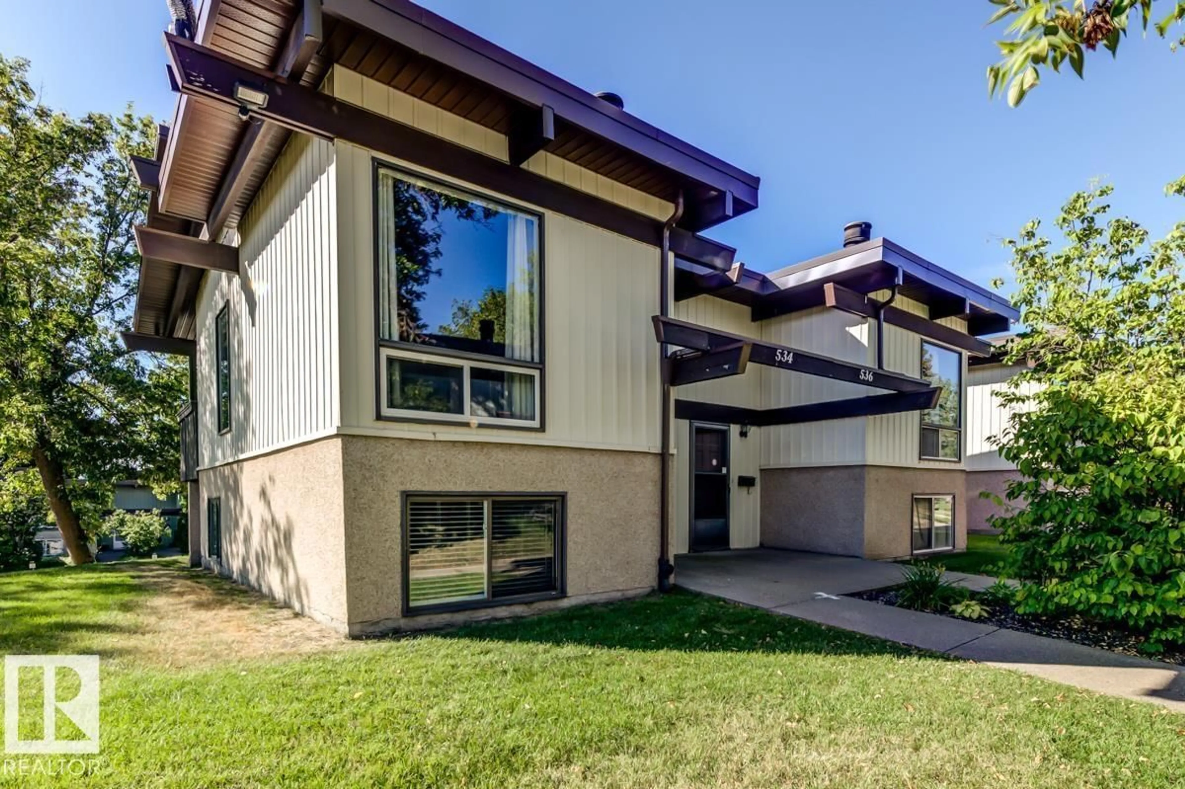 Home with brick exterior material, street for 534 LEE RIDGE RD, Edmonton Alberta T6K2K3