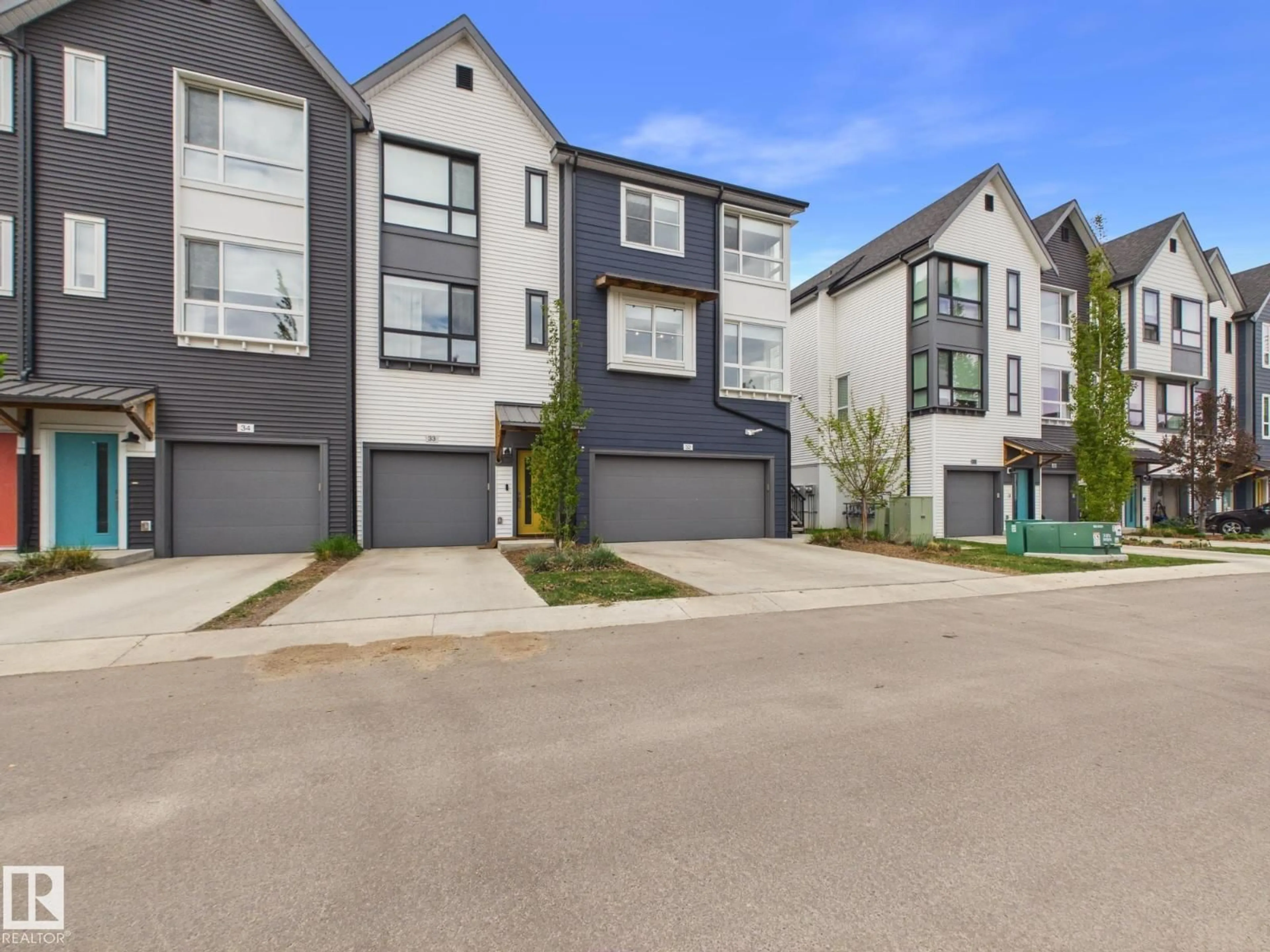 A pic from outside/outdoor area/front of a property/back of a property/a pic from drone, street for 32 100 JENSEN LAKES BV, St. Albert Alberta T8N7T9