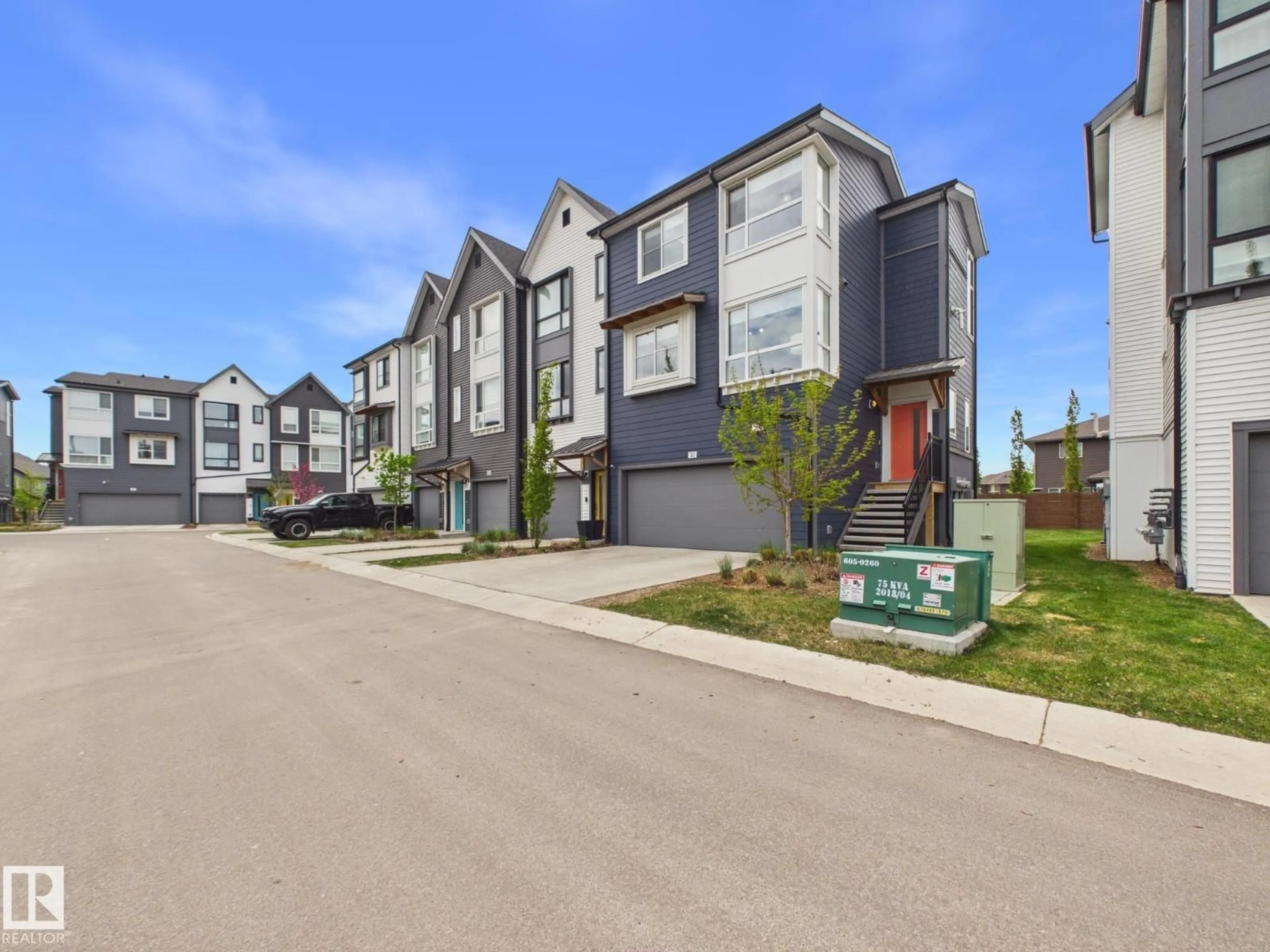 A pic from outside/outdoor area/front of a property/back of a property/a pic from drone, street for 32 100 JENSEN LAKES BV, St. Albert Alberta T8N7T9