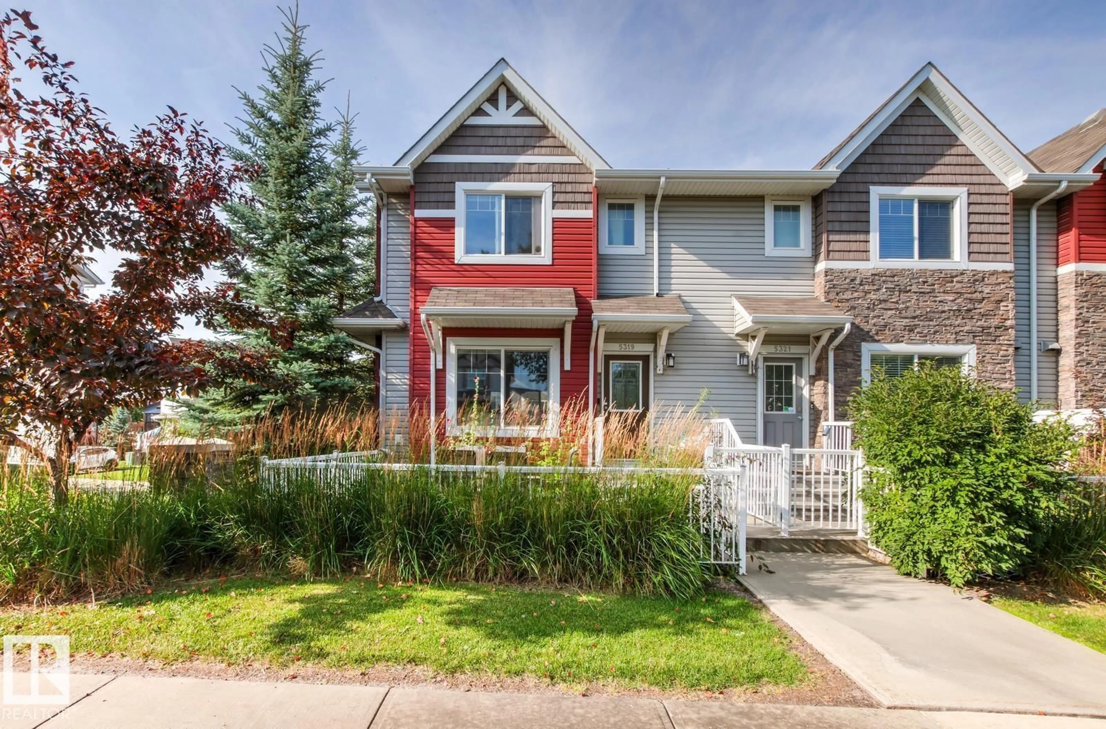 Home with vinyl exterior material, street for 5319 3 AV SW, Edmonton Alberta T6X0W7