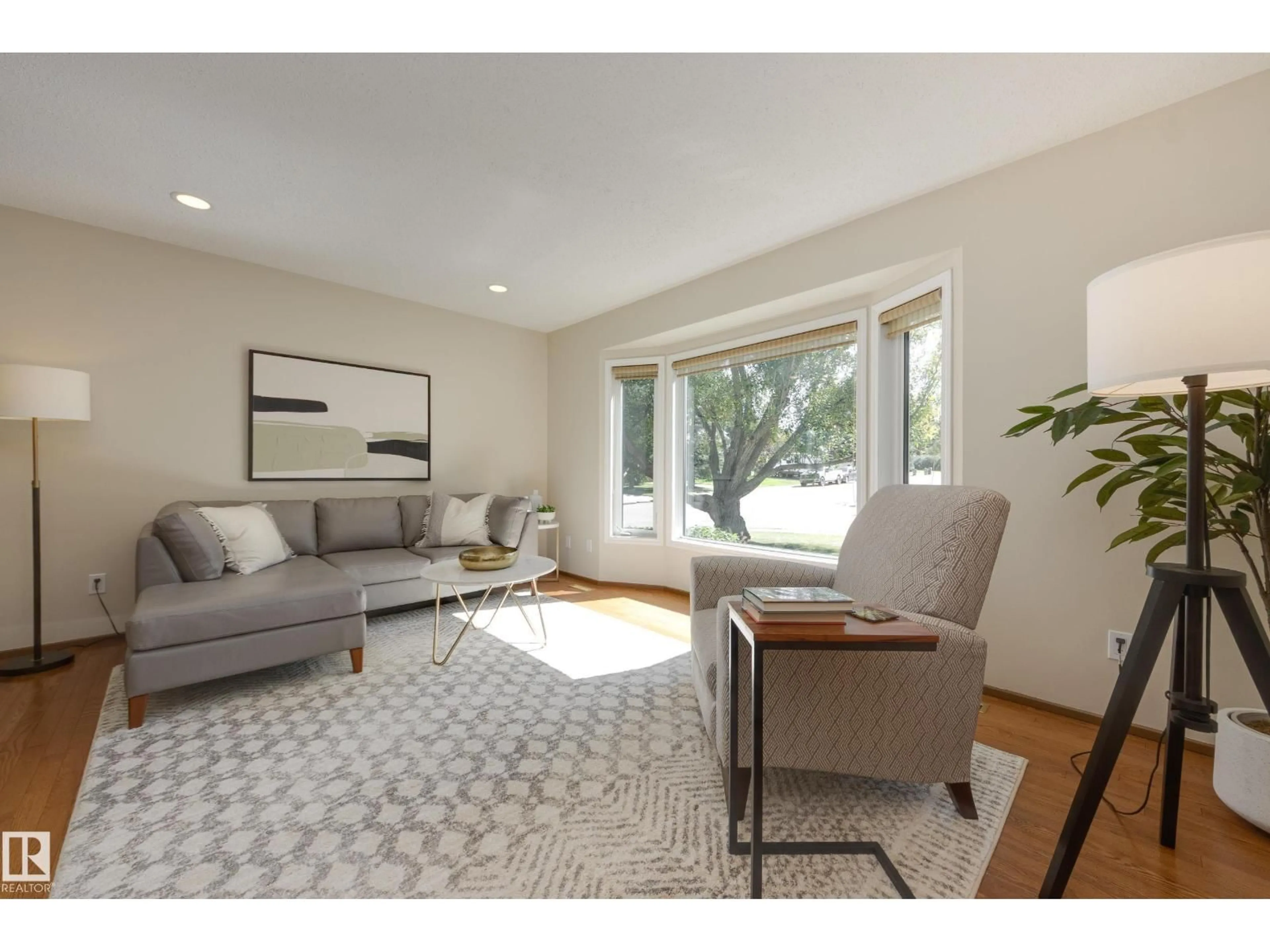 Living room with furniture, unknown for 4904 11 AV, Edmonton Alberta T6L5W8