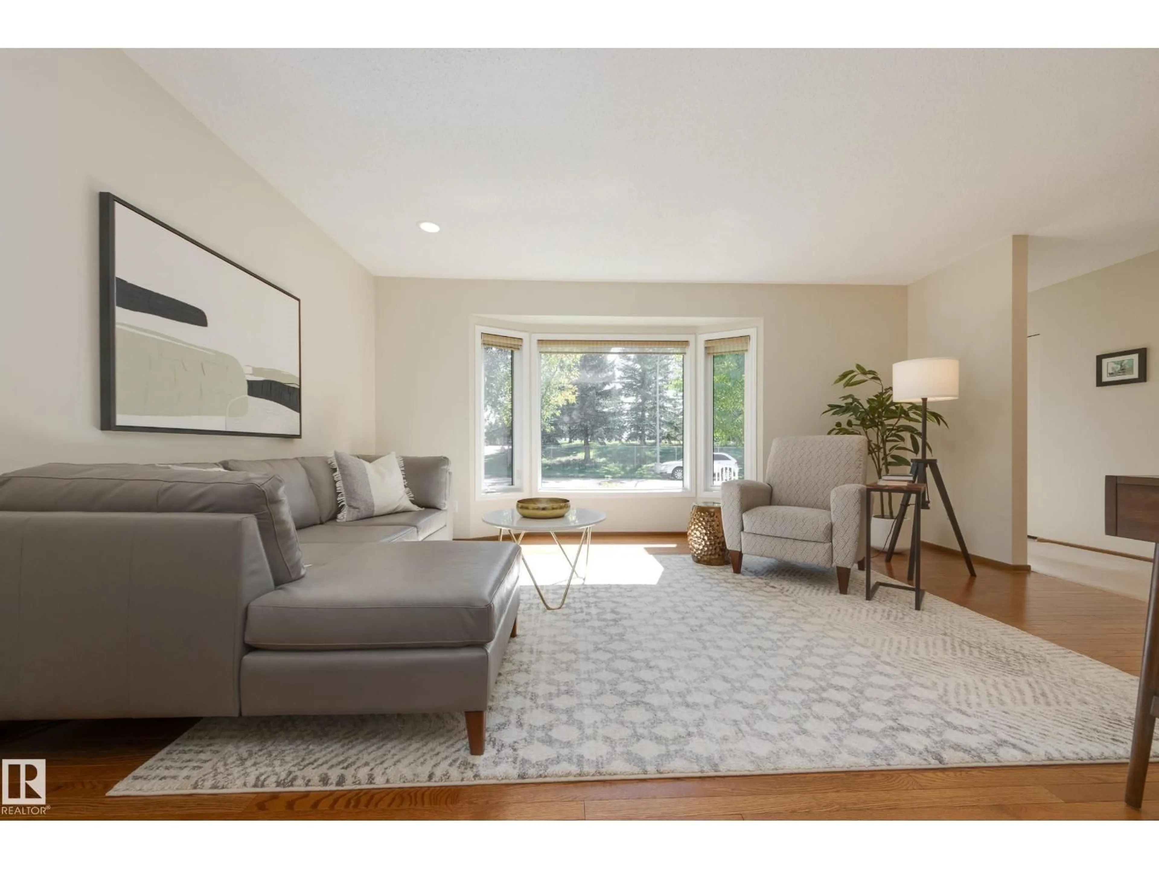 Living room with furniture, unknown for 4904 11 AV, Edmonton Alberta T6L5W8