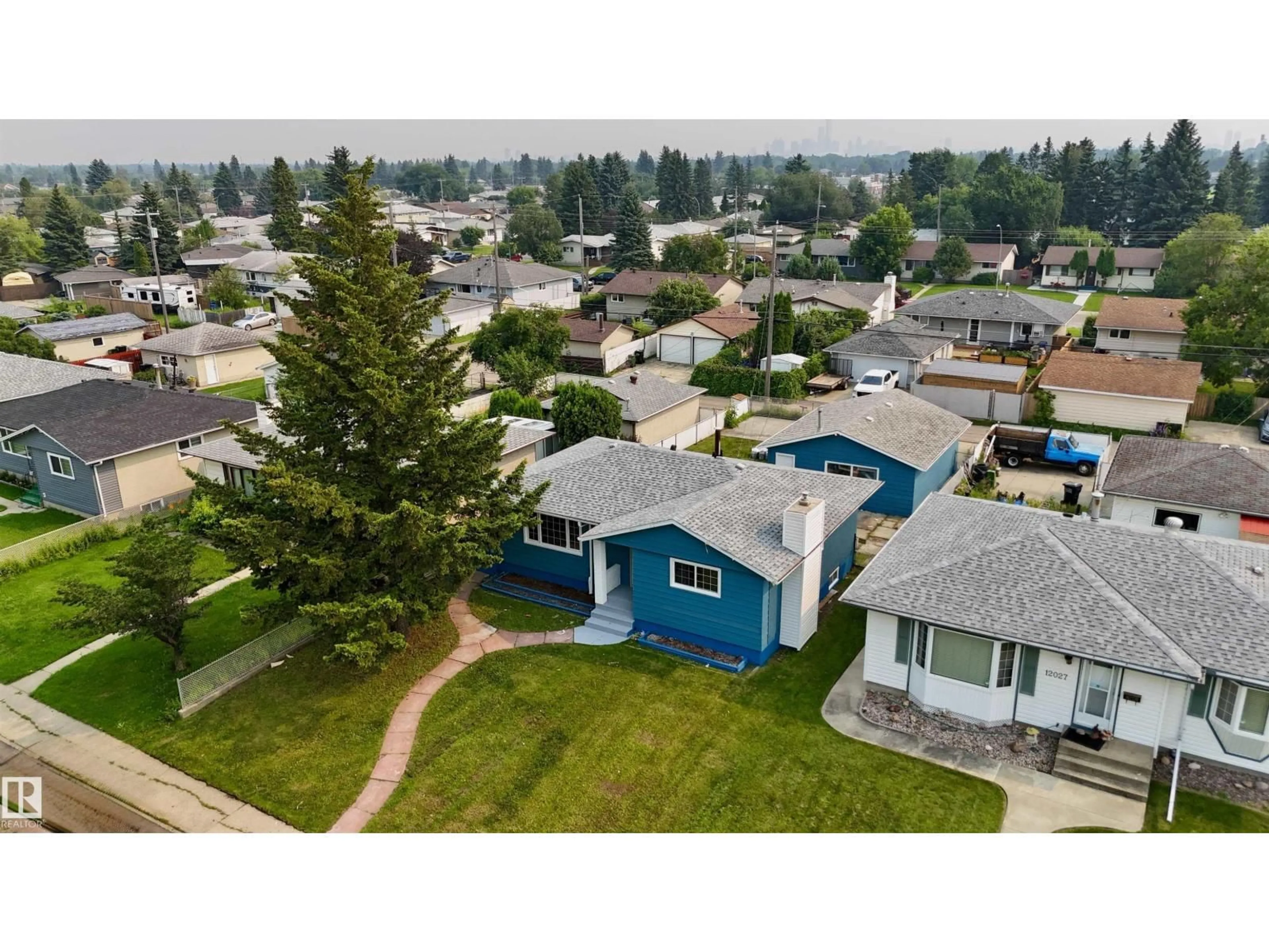A pic from outside/outdoor area/front of a property/back of a property/a pic from drone, street for 12023 137 AV, Edmonton Alberta T5E1Z7