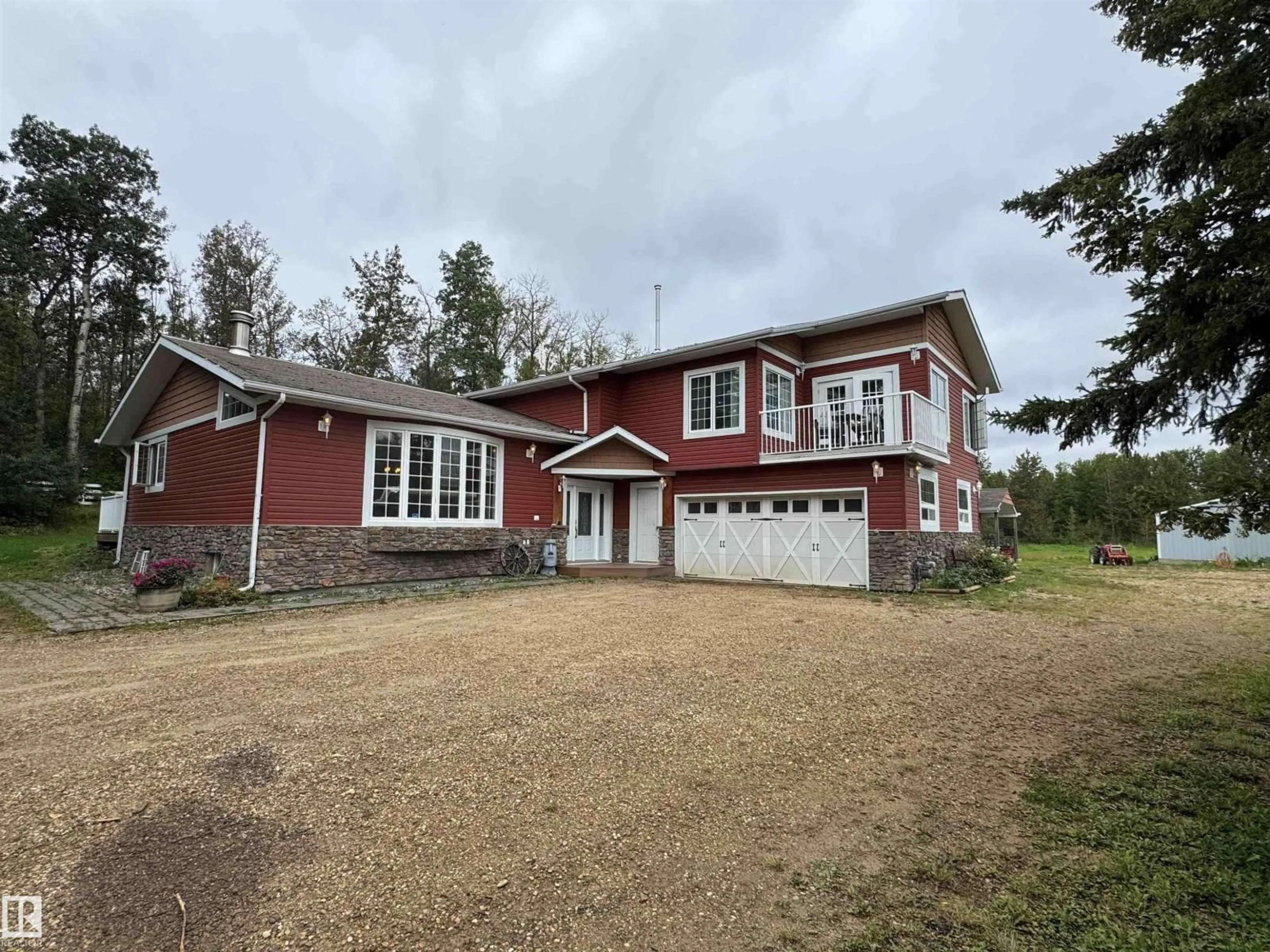 A pic from outside/outdoor area/front of a property/back of a property/a pic from drone, building for 97 - 52356 RGE ROAD 221, Rural Strathcona County Alberta T8E1W2