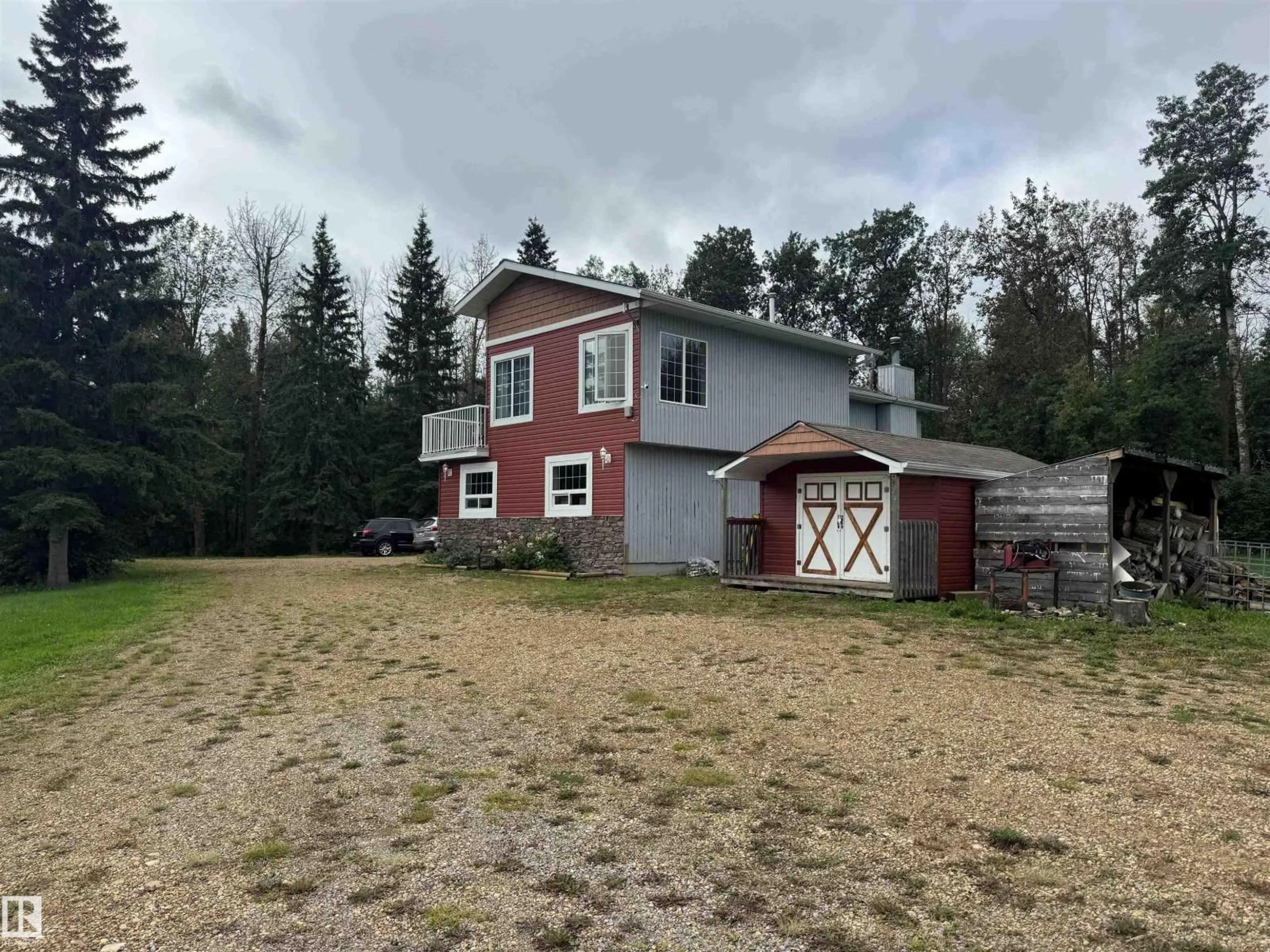 A pic from outside/outdoor area/front of a property/back of a property/a pic from drone, unknown for 97 - 52356 RGE ROAD 221, Rural Strathcona County Alberta T8E1W2