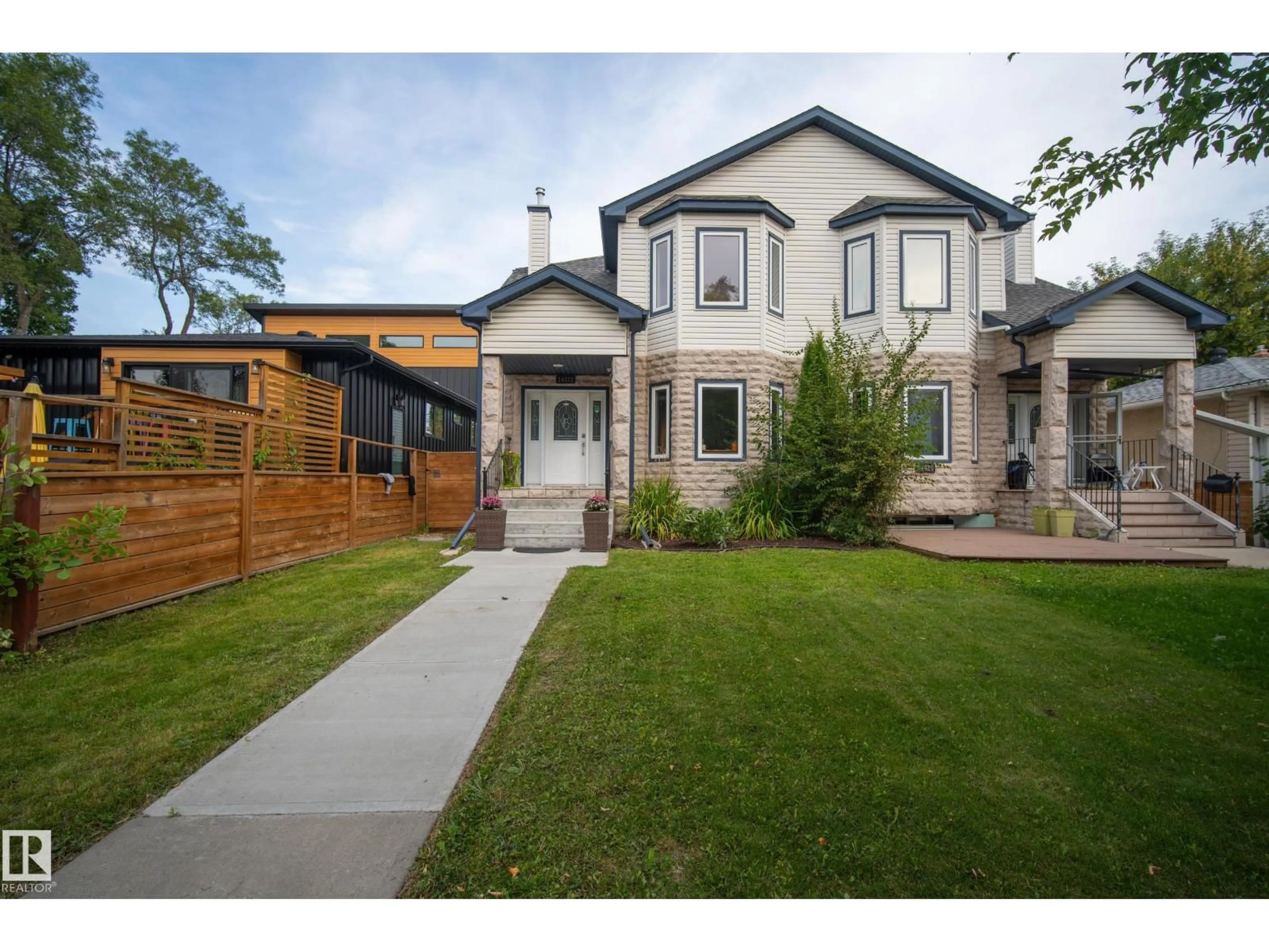 Home with brick exterior material, street for NW - 14422 104 AV, Edmonton Alberta T5N0X1