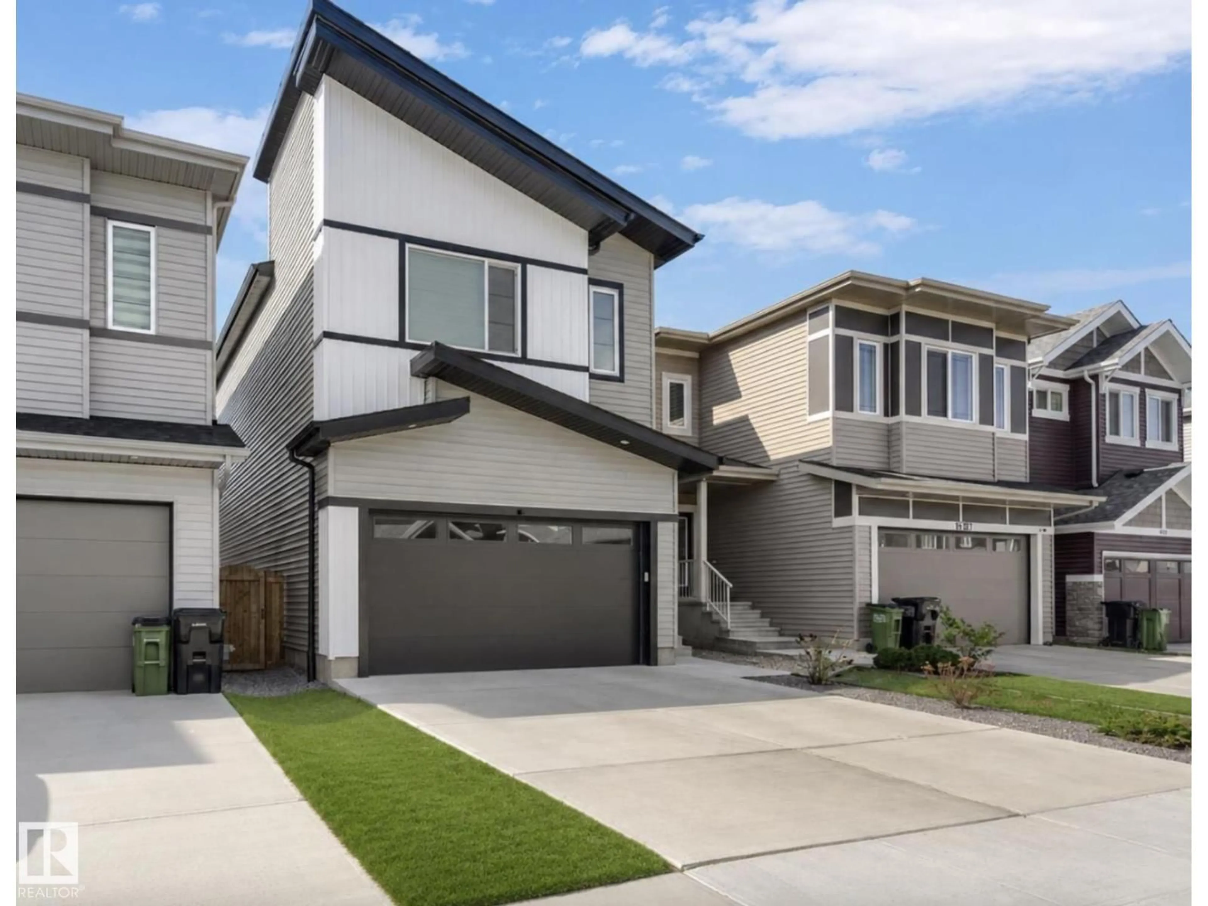 Home with vinyl exterior material, street for 19703 29 AVENUE AVENUE, Edmonton Alberta T6M1M2