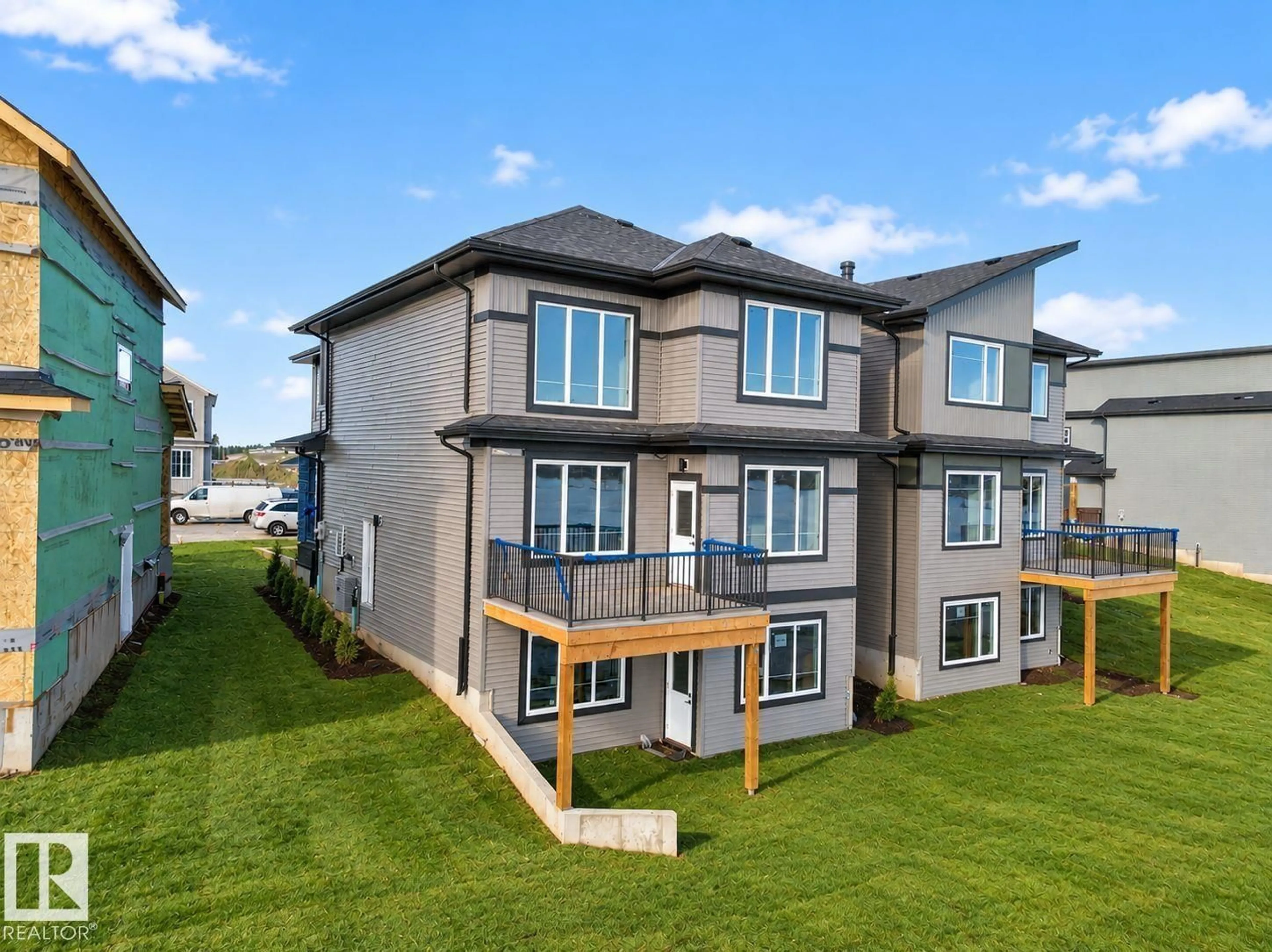 A pic from outside/outdoor area/front of a property/back of a property/a pic from drone, unknown for 461 CRYSTAL CREEK LI, Leduc Alberta T9E0X6