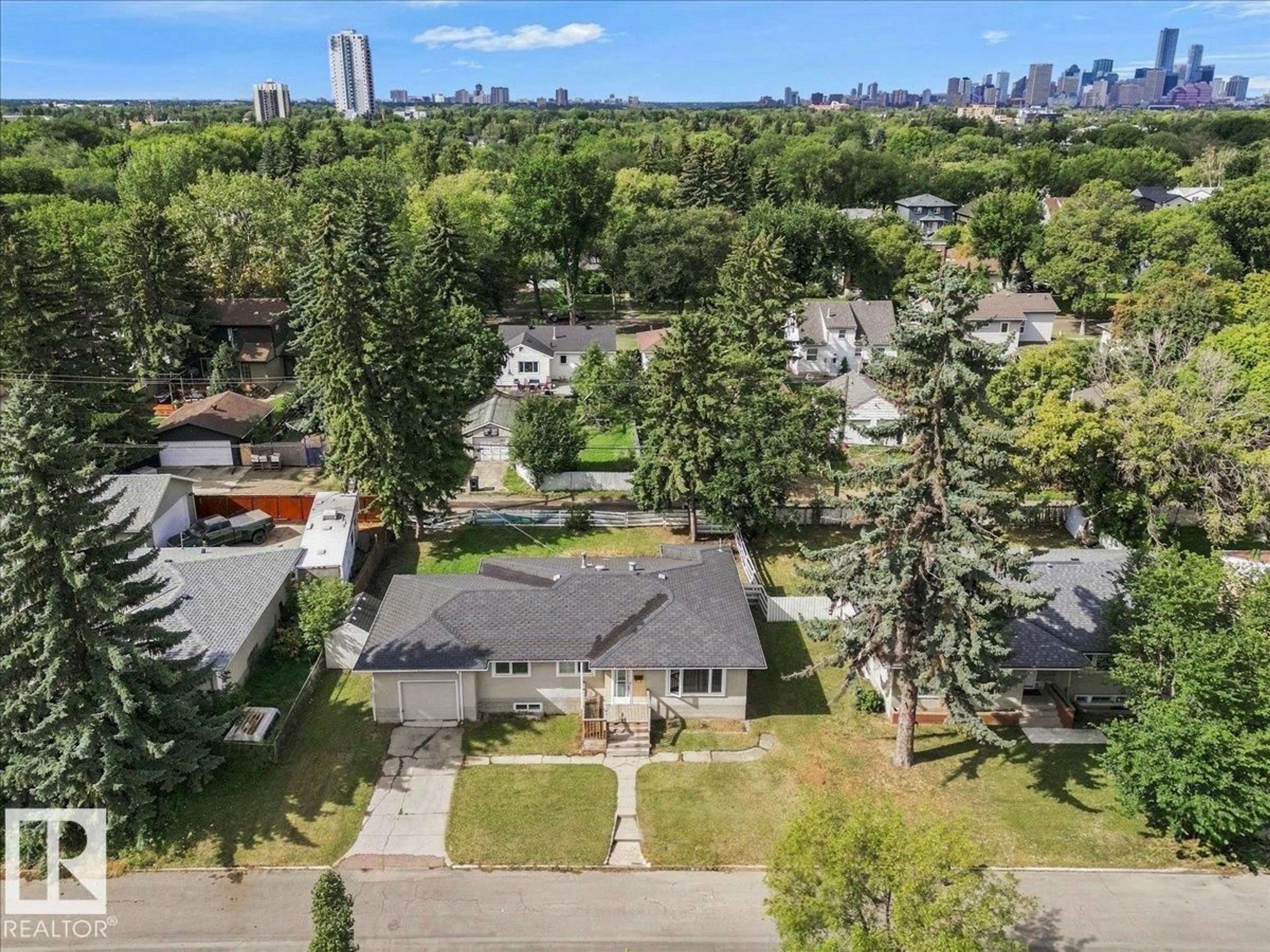 A pic from outside/outdoor area/front of a property/back of a property/a pic from drone, unknown for 9228 75 ST, Edmonton Alberta T6C2H4