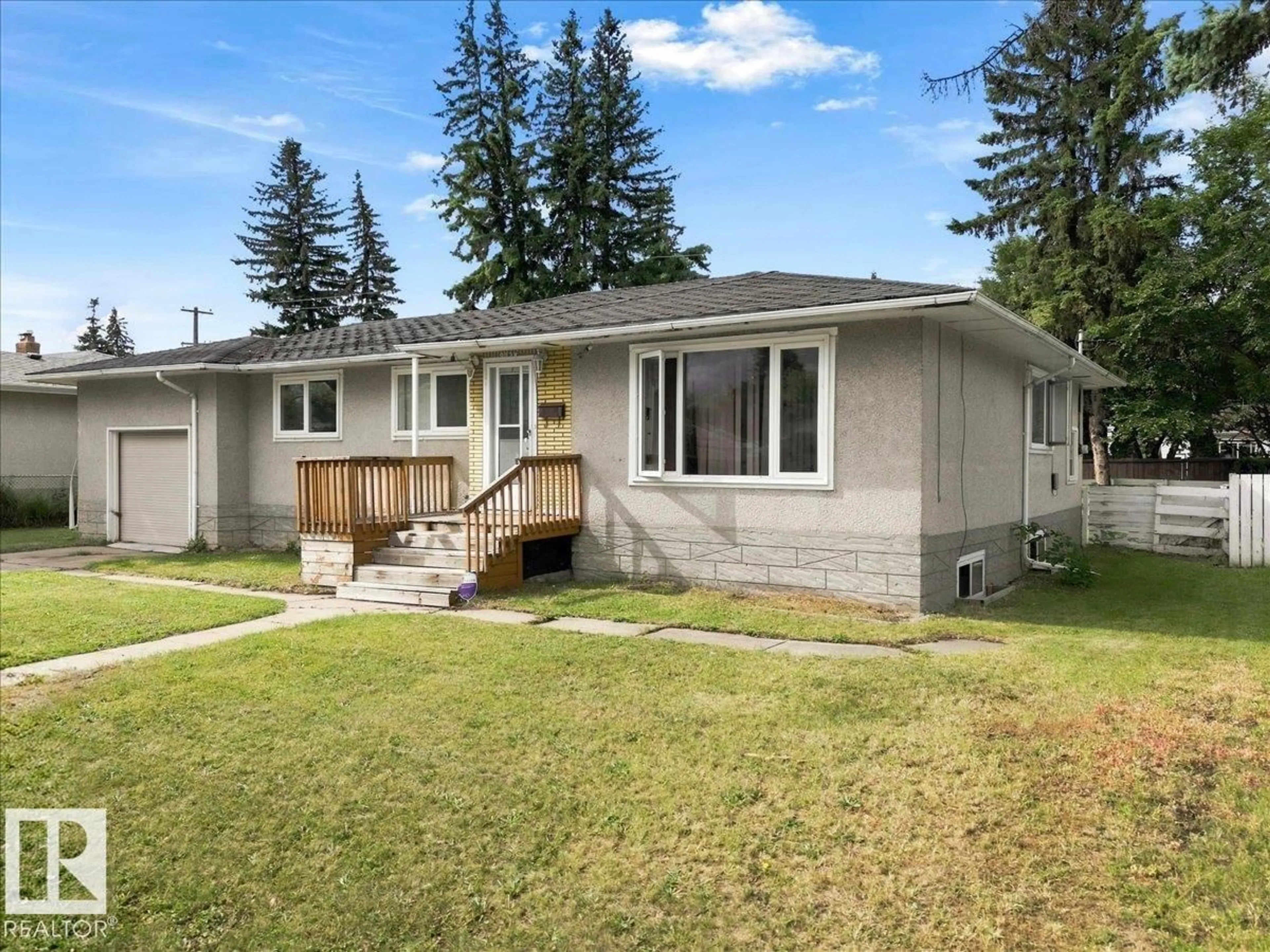 Home with vinyl exterior material, street for 9228 75 ST, Edmonton Alberta T6C2H4
