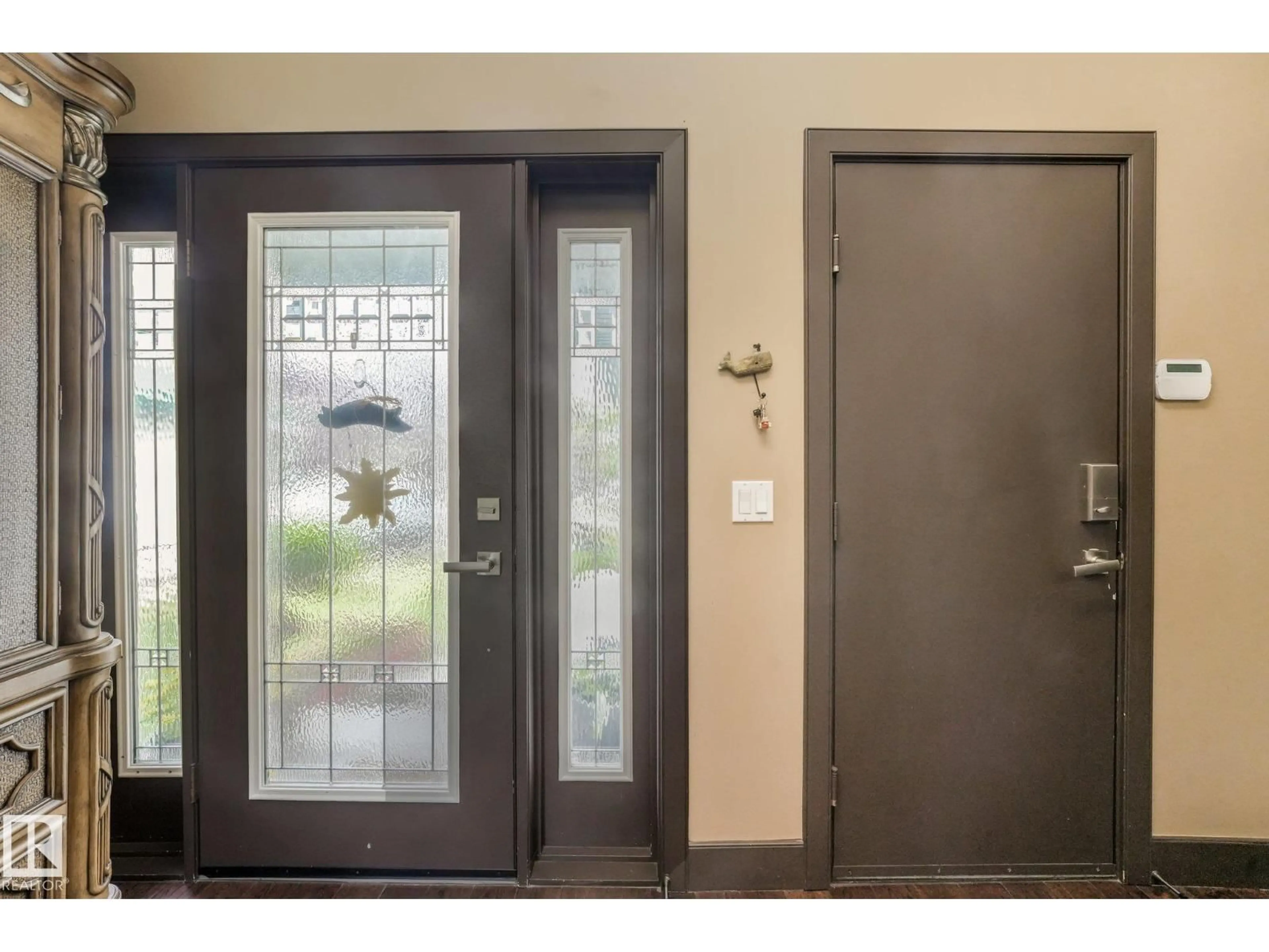 Indoor entryway for 12827 150 AV, Edmonton Alberta T6V1H1