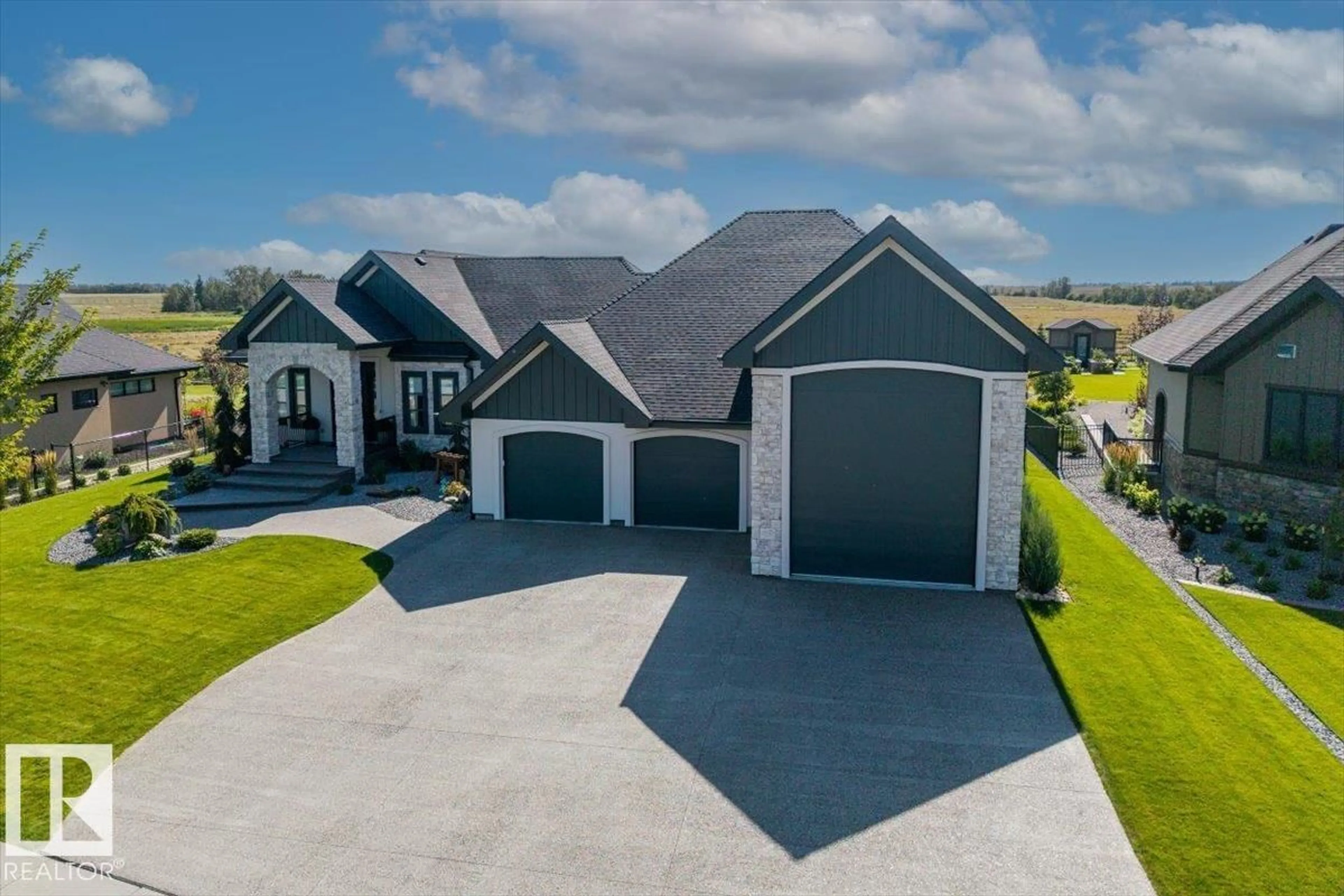 A pic from outside/outdoor area/front of a property/back of a property/a pic from drone, street for 1098 GENESIS LAKE BLVD, Stony Plain Alberta T7Z0G3