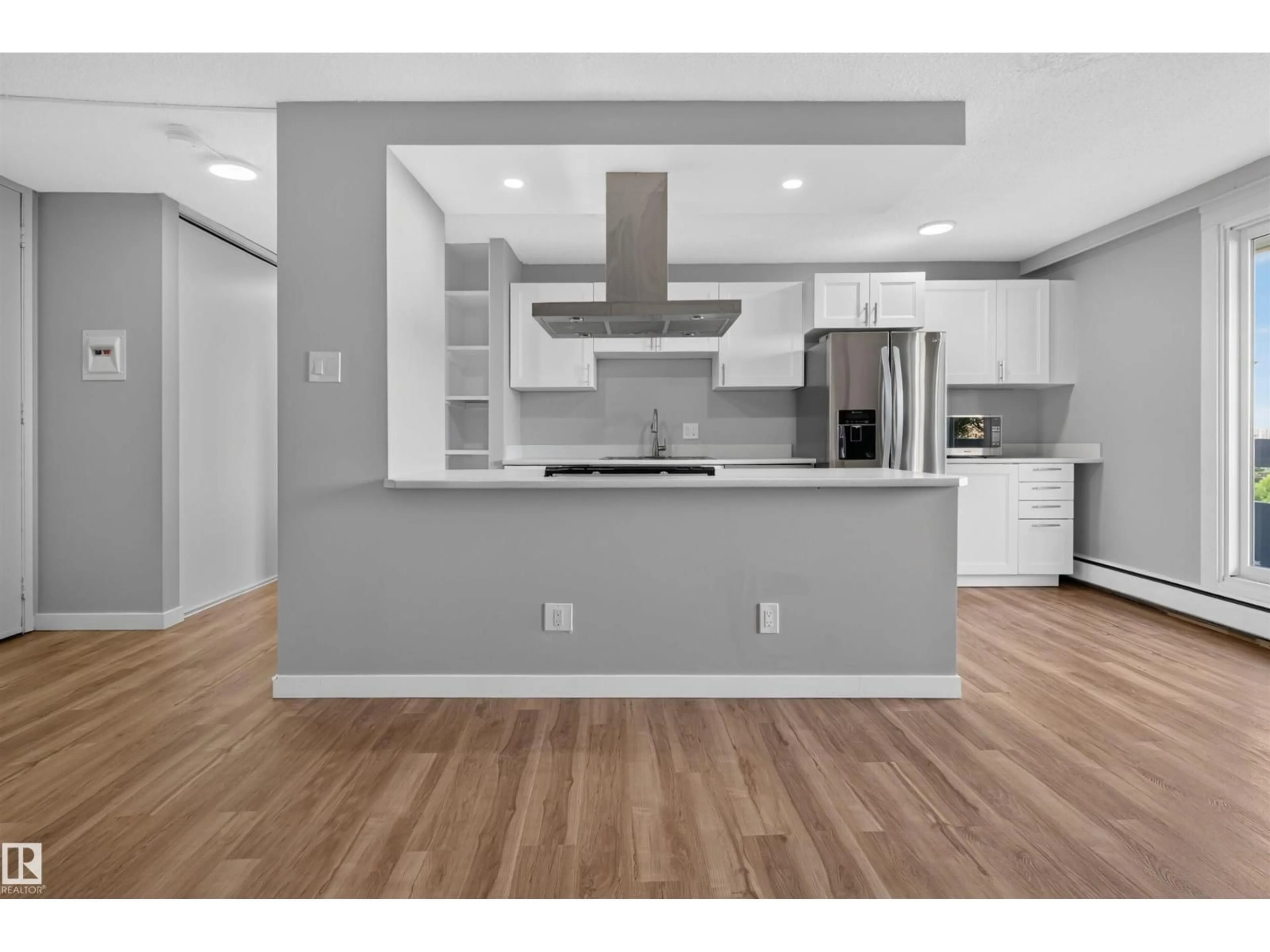 Open concept kitchen, wood/laminate floor for 207 - 10883 SASKATCHEWAN DR NW, Edmonton Alberta T6E4S6