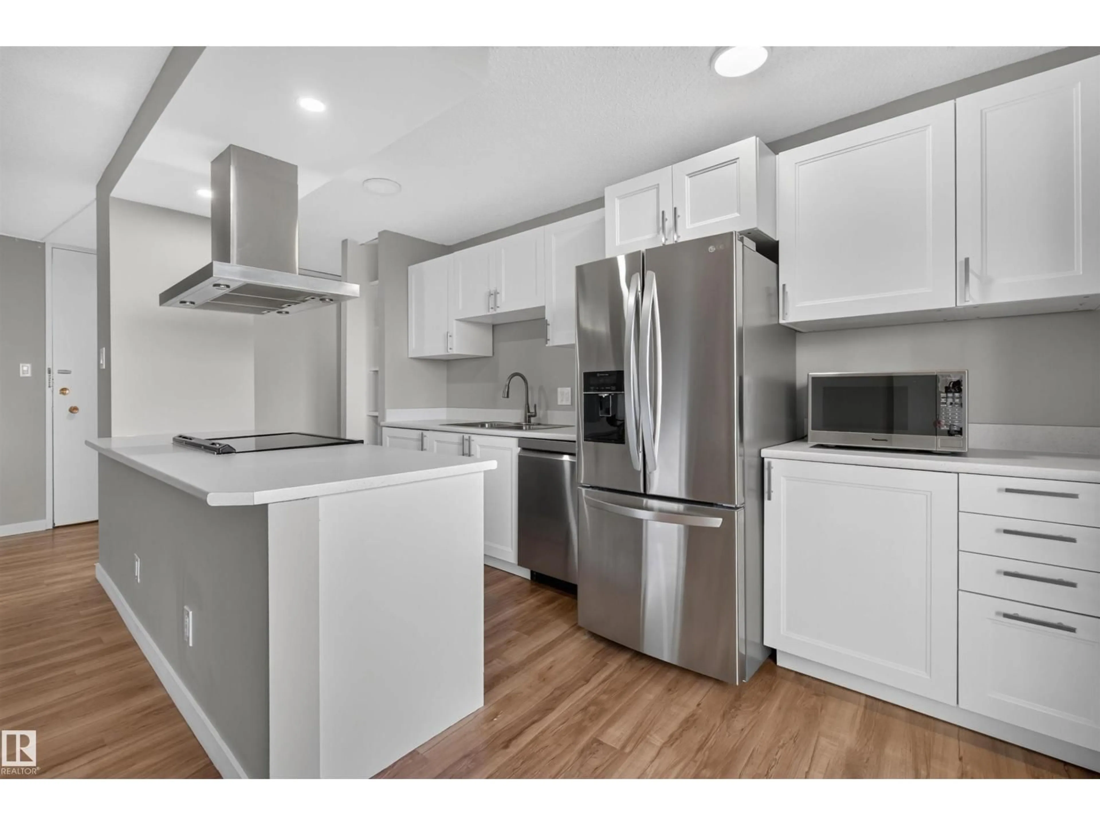 Open concept kitchen, wood/laminate floor for 207 - 10883 SASKATCHEWAN DR NW, Edmonton Alberta T6E4S6