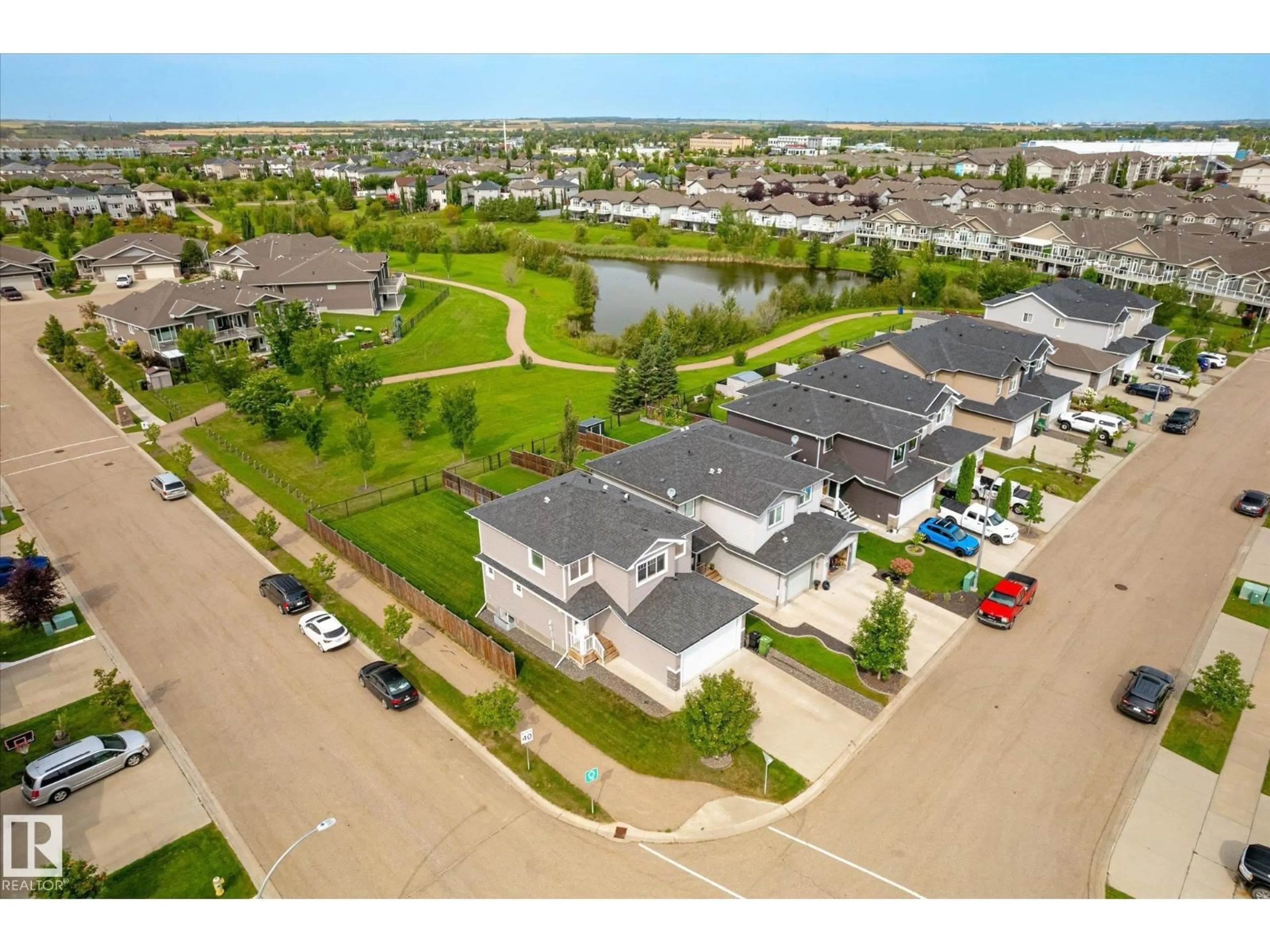 A pic from outside/outdoor area/front of a property/back of a property/a pic from drone, water/lake/river/ocean view for 38 RICHMOND LI, Fort Saskatchewan Alberta T8L0S2
