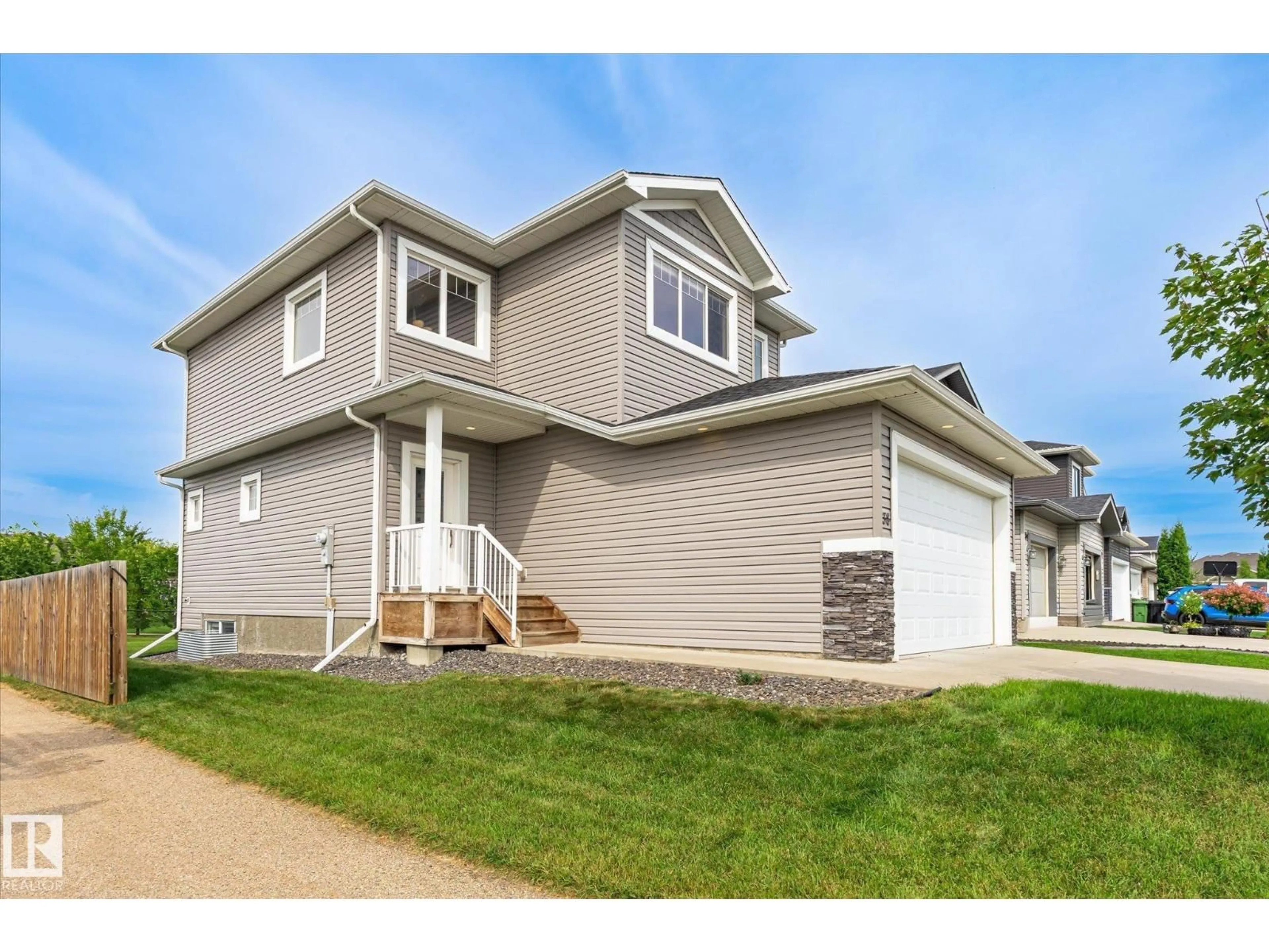 Home with vinyl exterior material, street for 38 RICHMOND LI, Fort Saskatchewan Alberta T8L0S2