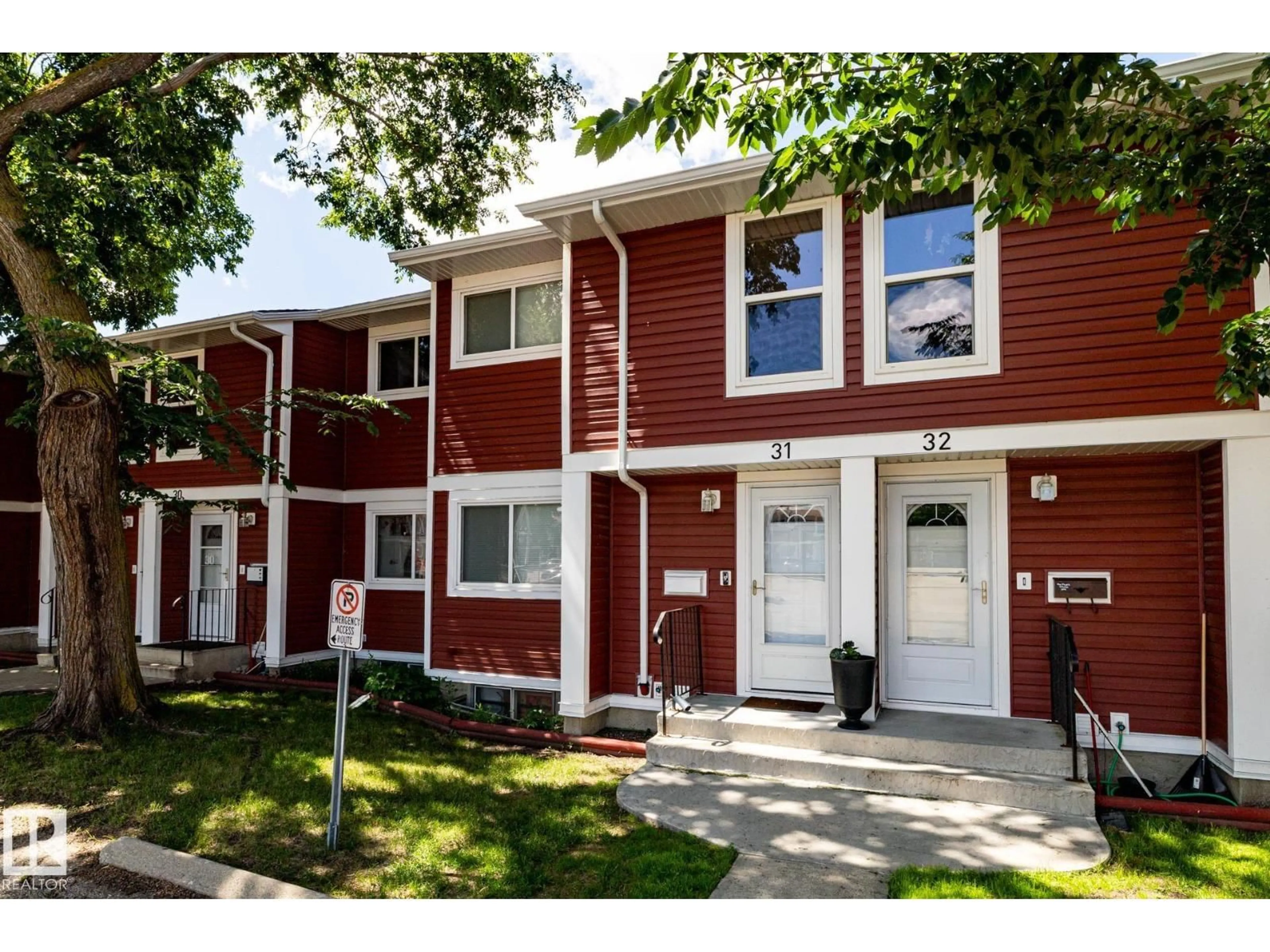 Home with vinyl exterior material, street for 31 - 4707 126 AV, Edmonton Alberta T5A4K4