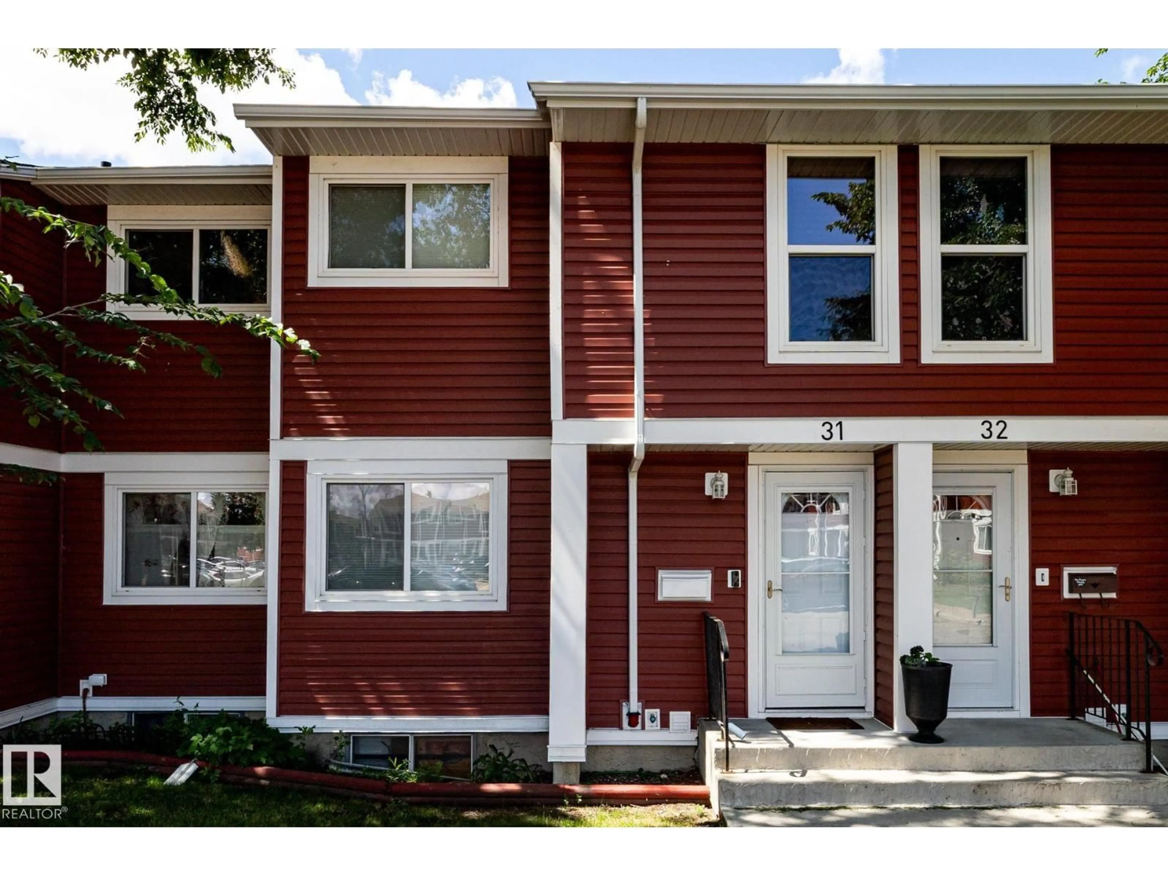 Home with vinyl exterior material, street for 31 - 4707 126 AV, Edmonton Alberta T5A4K4