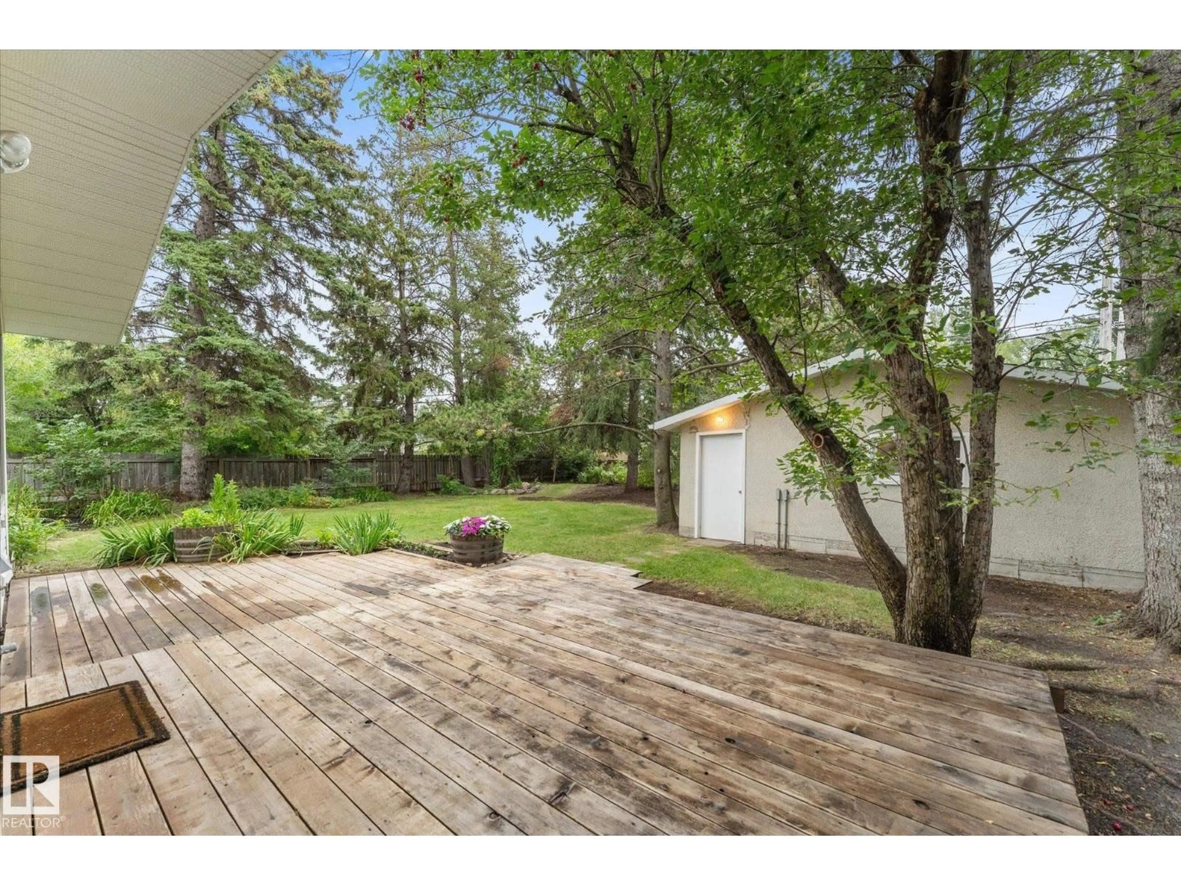 Patio, forest/trees view for 11311 MALMO RD, Edmonton Alberta T6H4M3