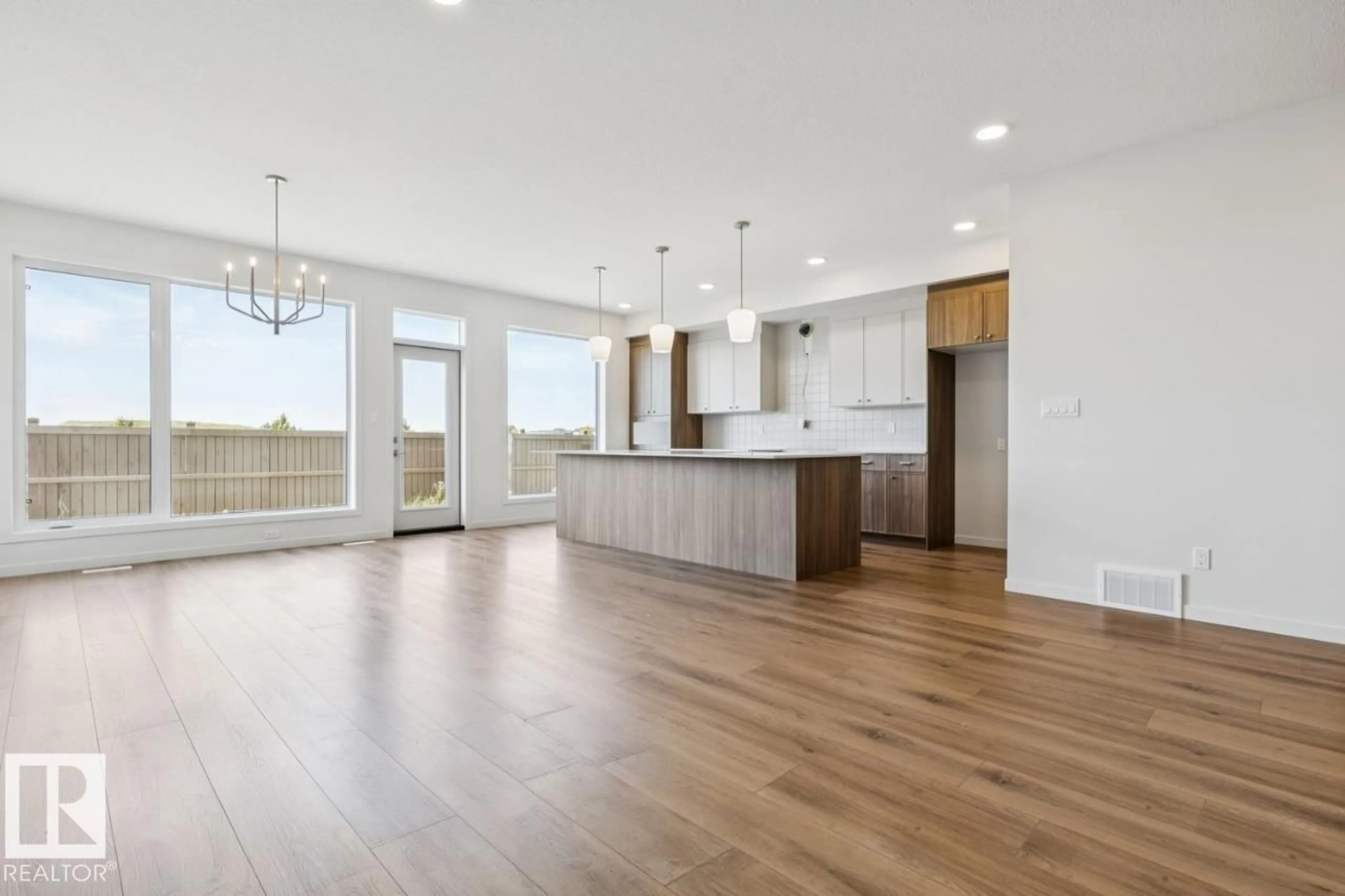 Open concept kitchen, wood/laminate floor for SW - 2336 160 ST, Edmonton Alberta T6W4E5