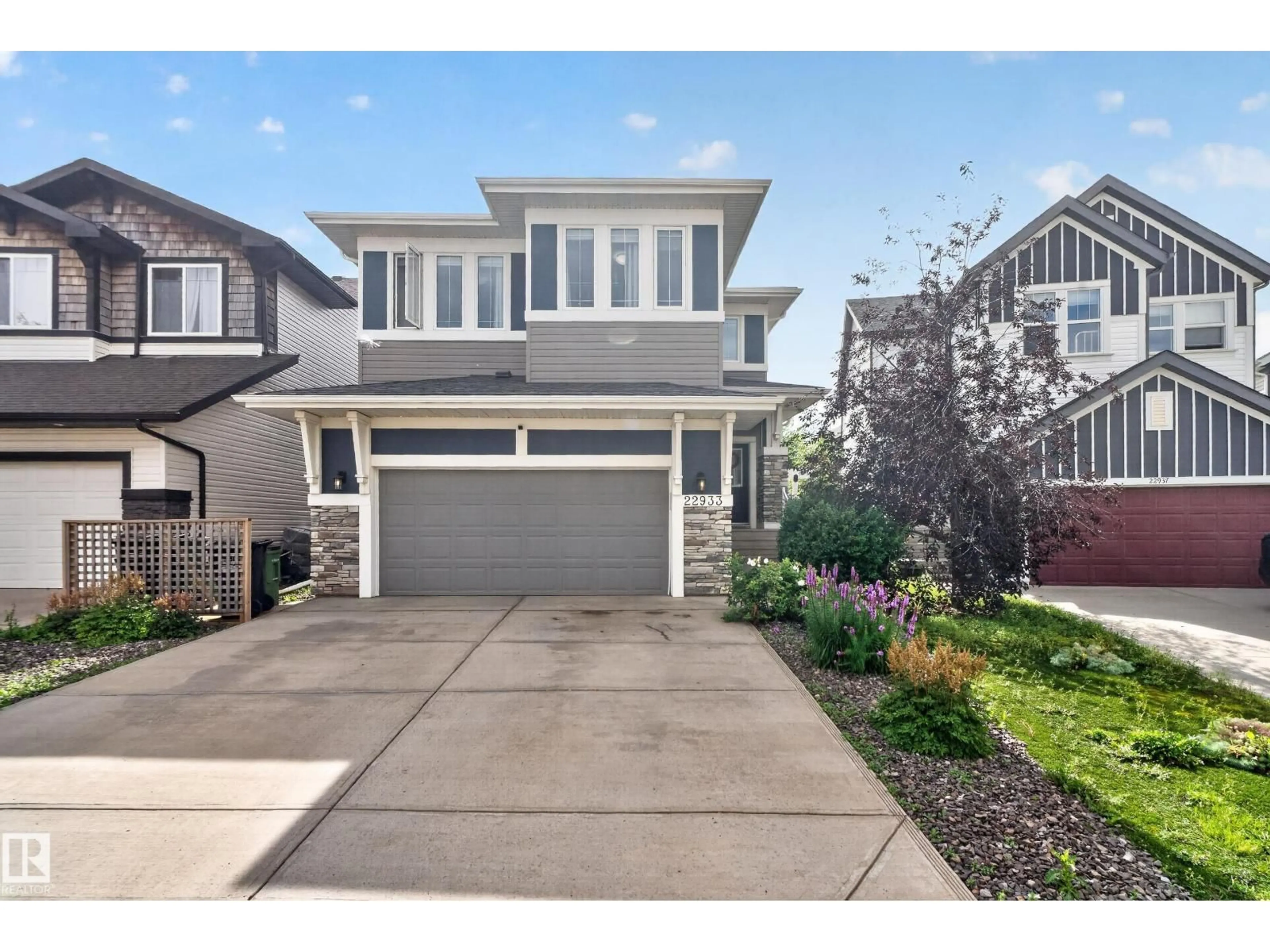 Home with vinyl exterior material, street for 22933 94A AV, Edmonton Alberta T5T7B5