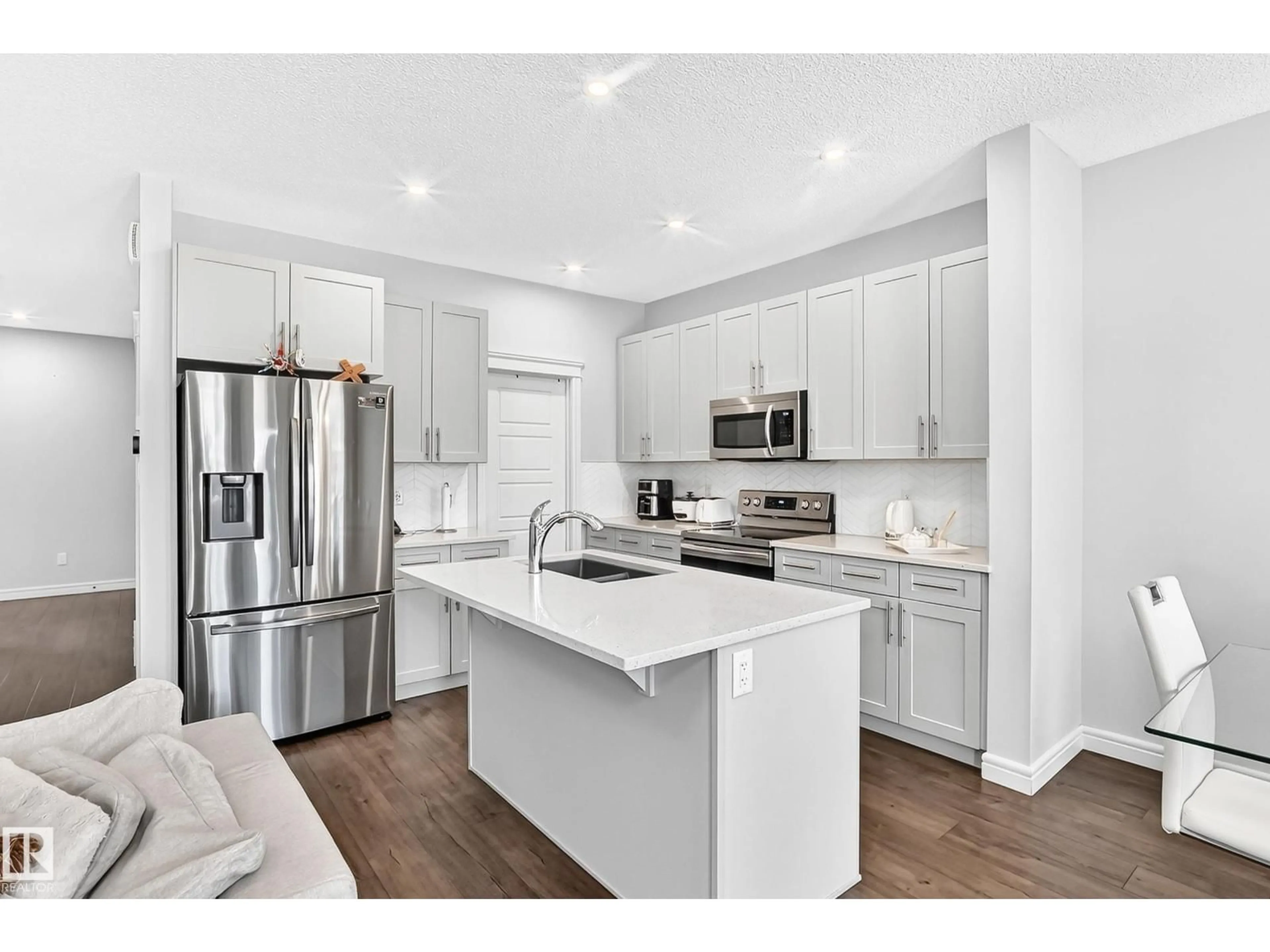 Open concept kitchen, unknown for 2628 DONAGHEY CR, Edmonton Alberta T6W4T2