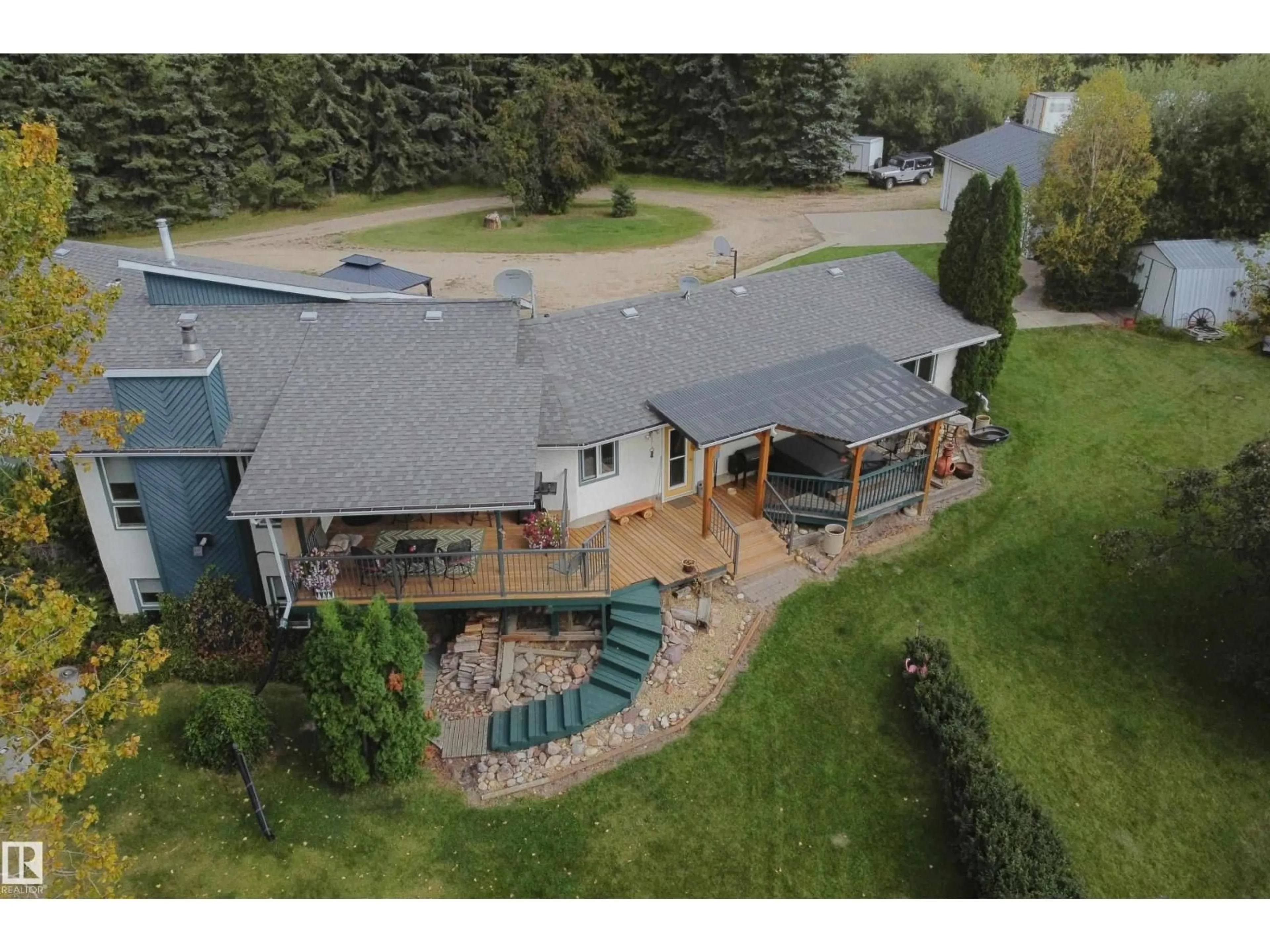 A pic from outside/outdoor area/front of a property/back of a property/a pic from drone, mountain view for 58505 HIGHWAY 33, Rural Barrhead County Alberta T0G2H0